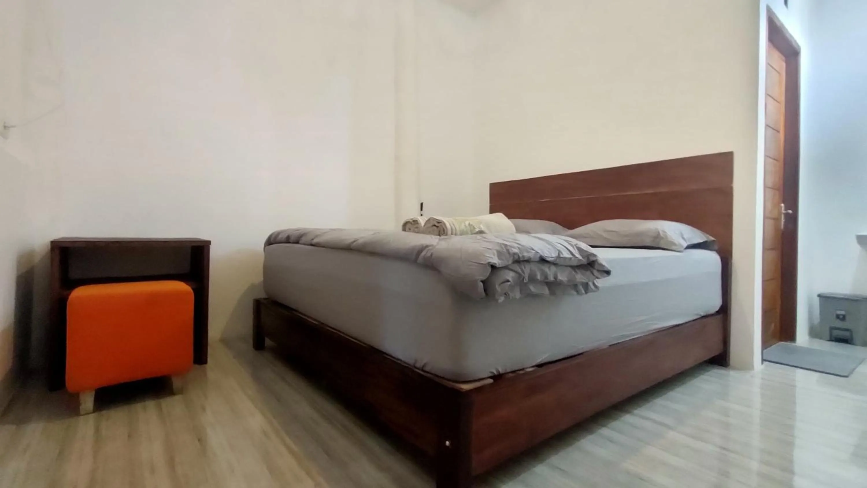 Bed in Angin Mamiri Rinjani Cottages And Restaurant