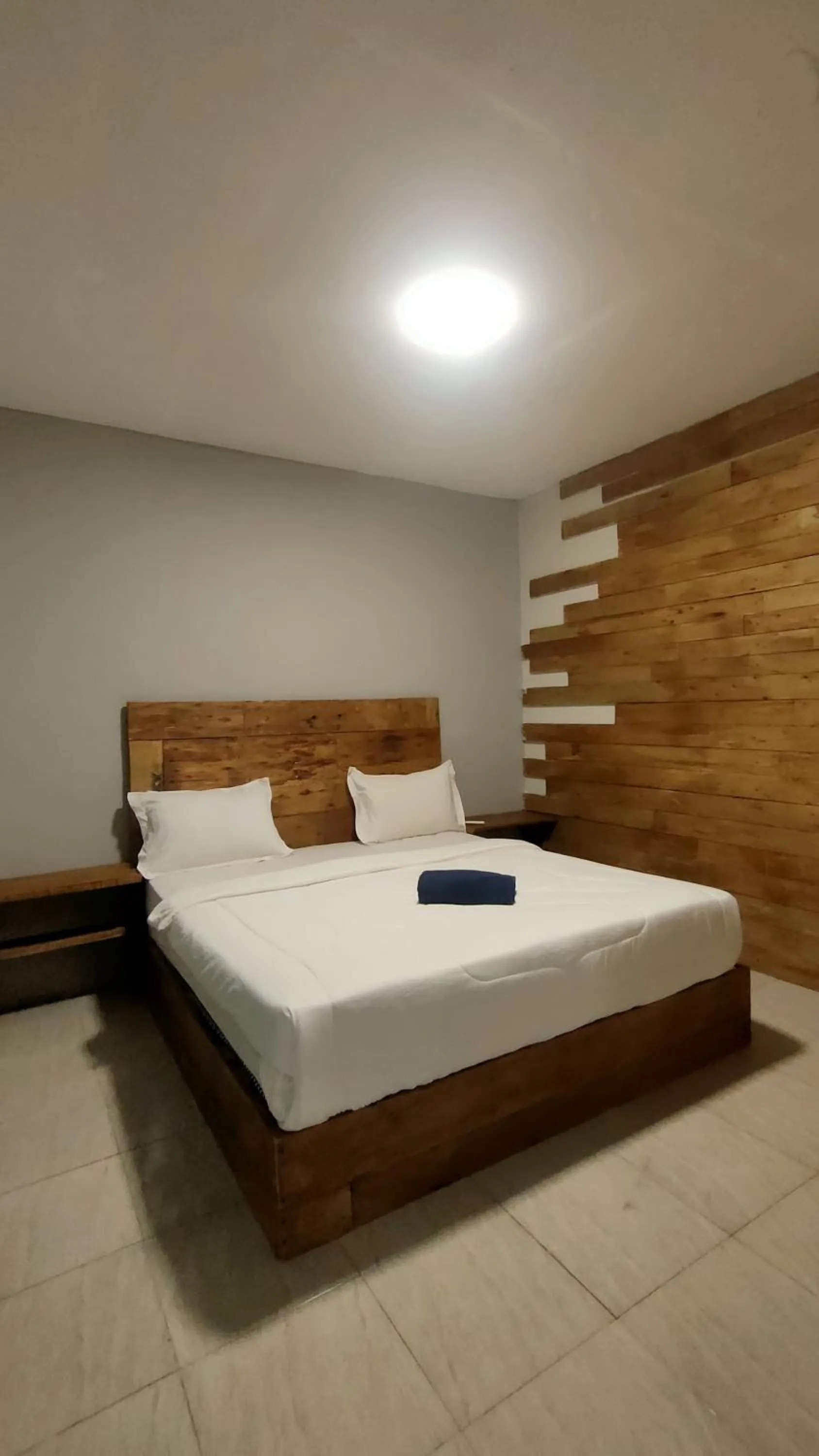 Bed in Angin Mamiri Rinjani Cottages And Restaurant