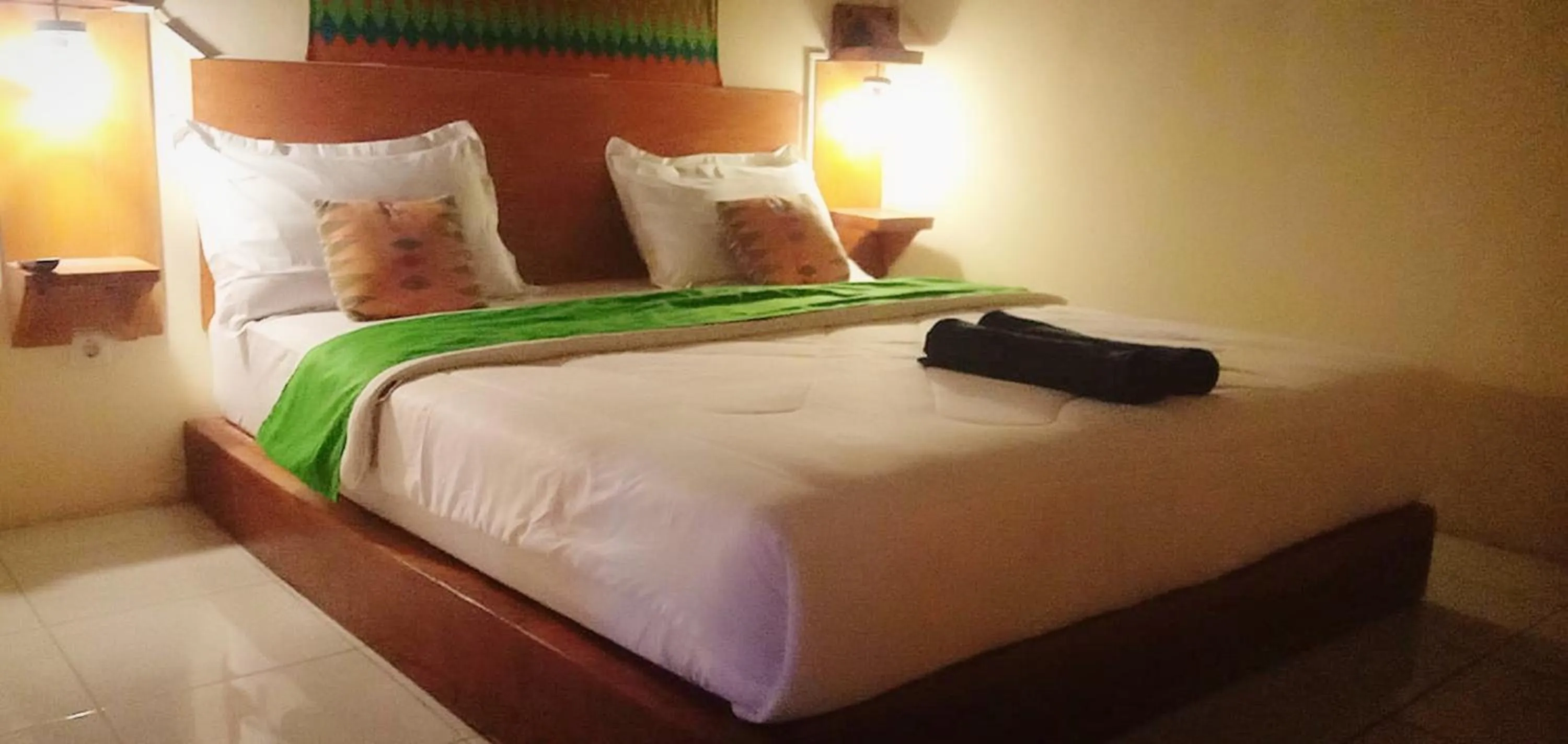 Bed in Angin Mamiri Rinjani Cottages And Restaurant