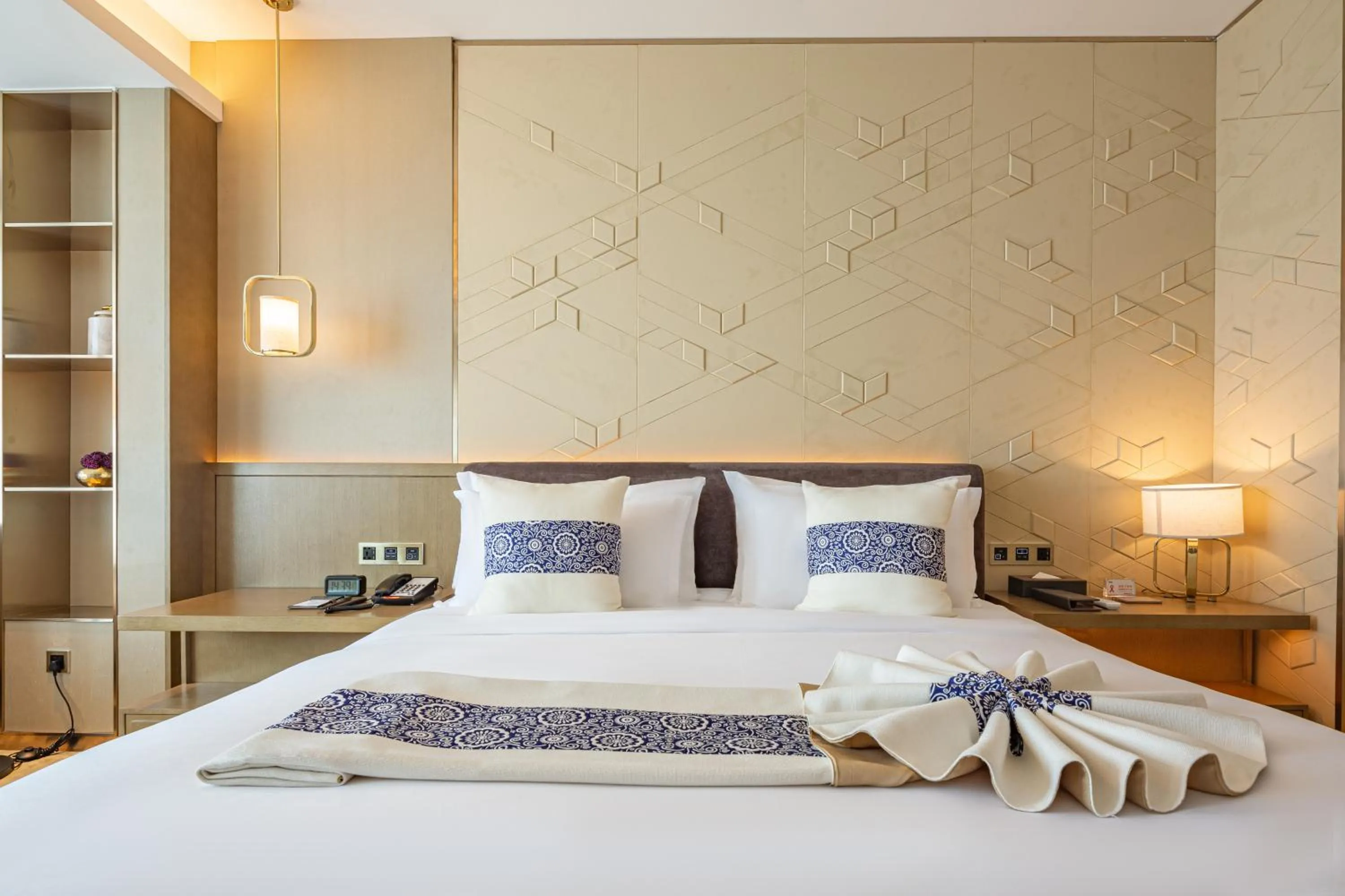 Bed in LIUZHOU PENGYI Hotel