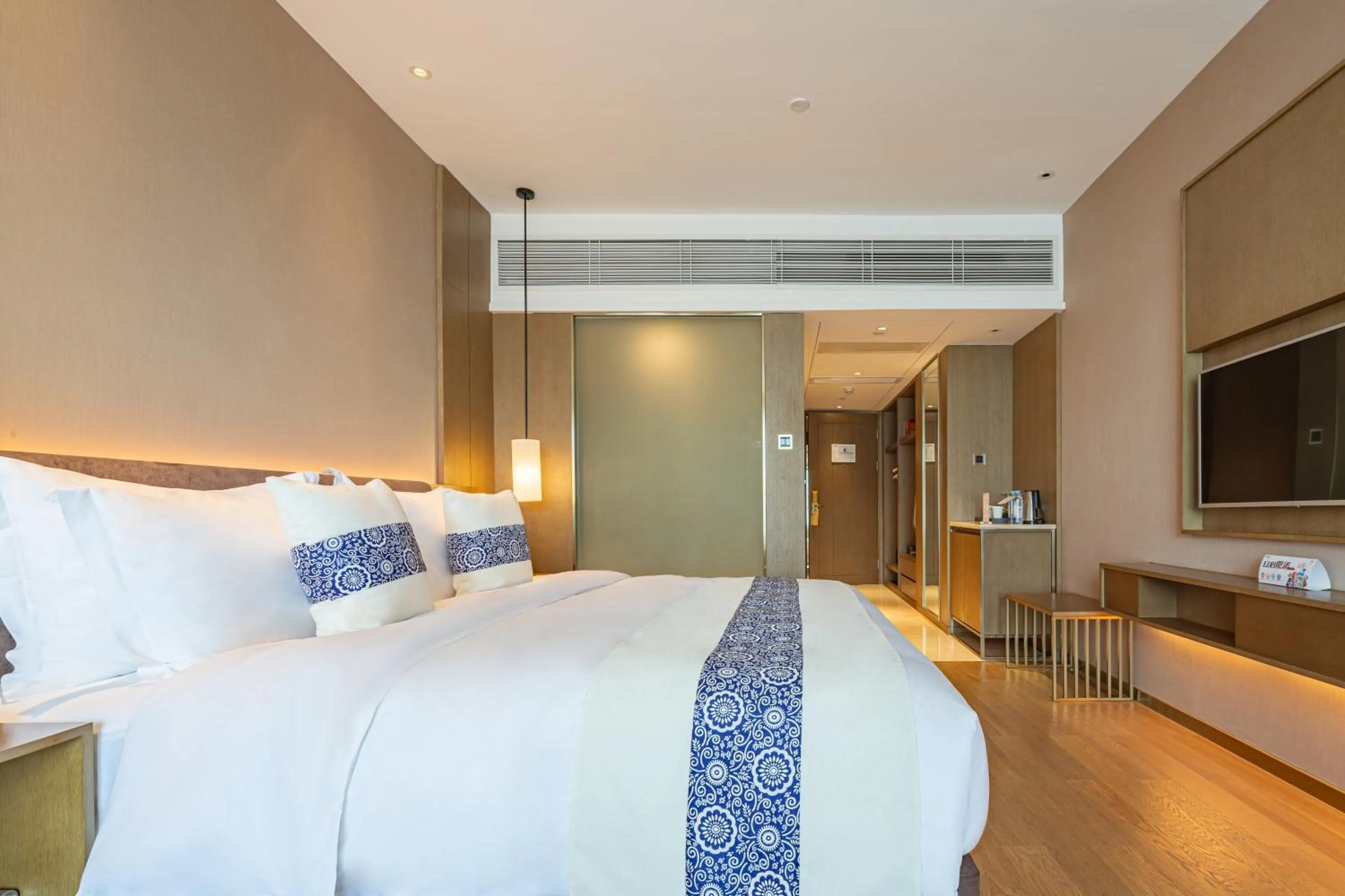 Bed in LIUZHOU PENGYI Hotel