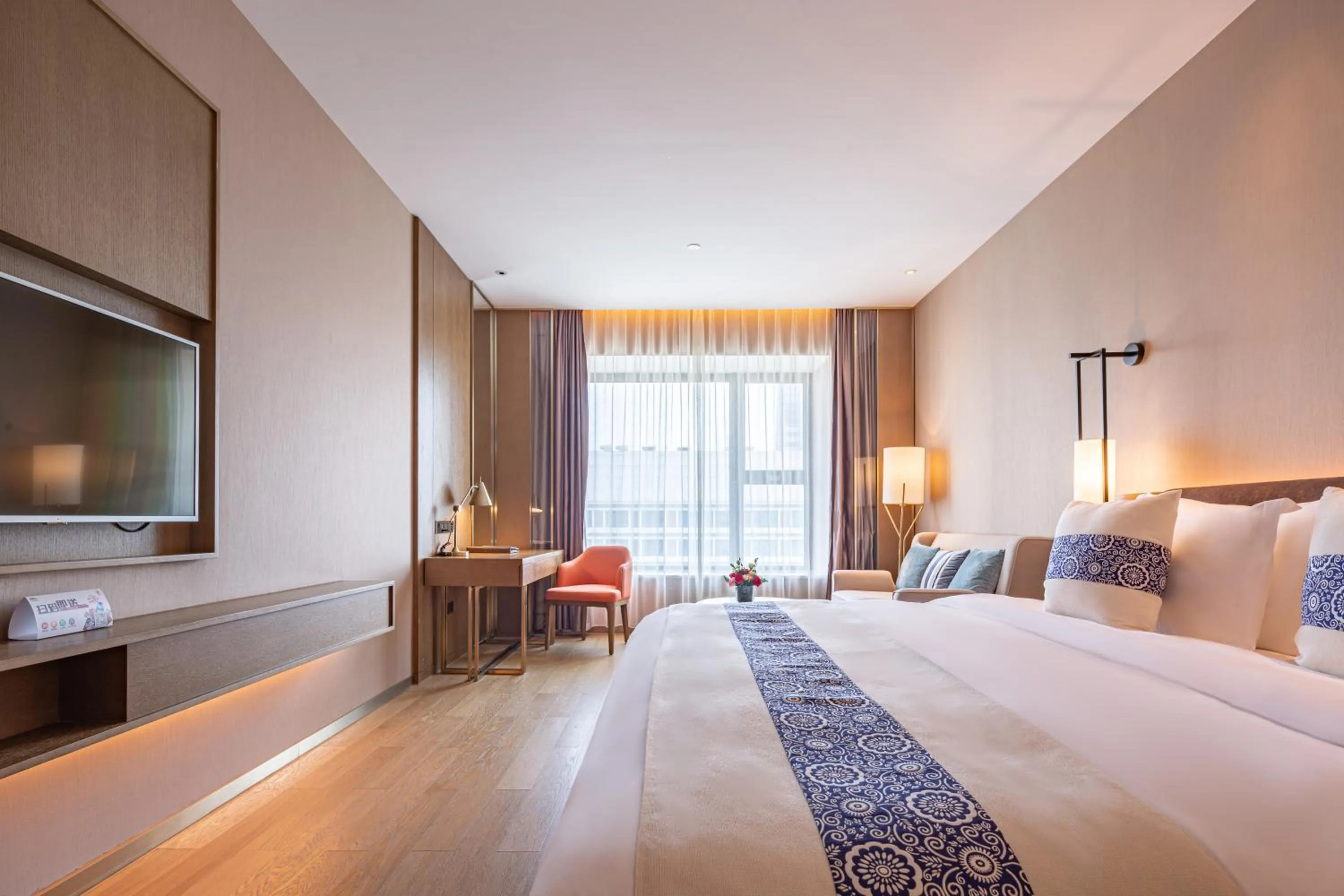 Bed in LIUZHOU PENGYI Hotel