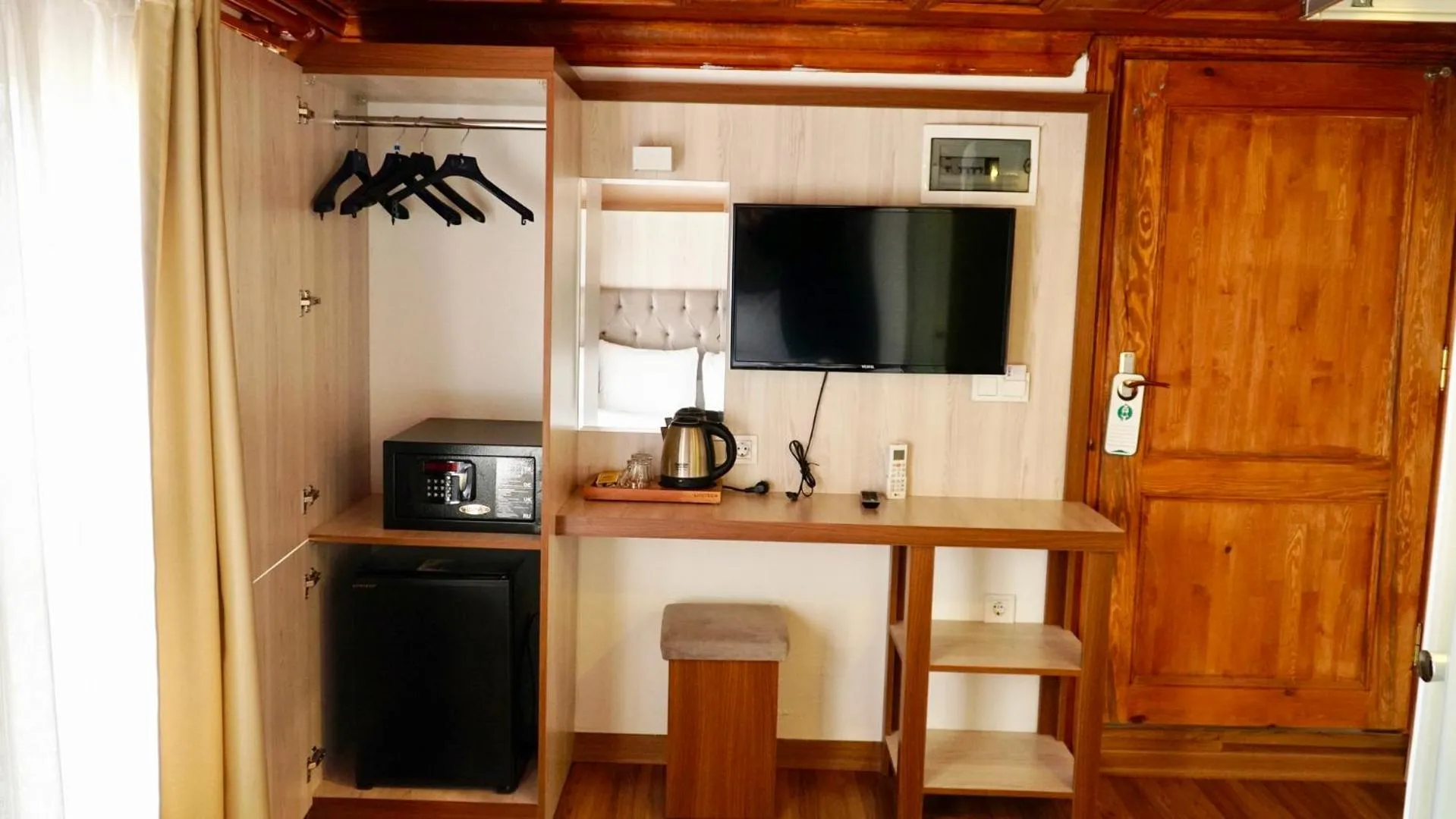 TV and multimedia in QONAQ HOTEL & SUITES