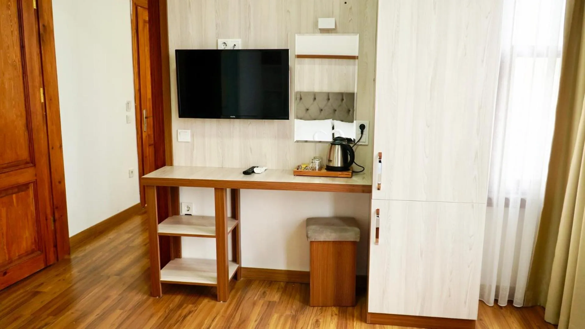 TV and multimedia in QONAQ HOTEL & SUITES