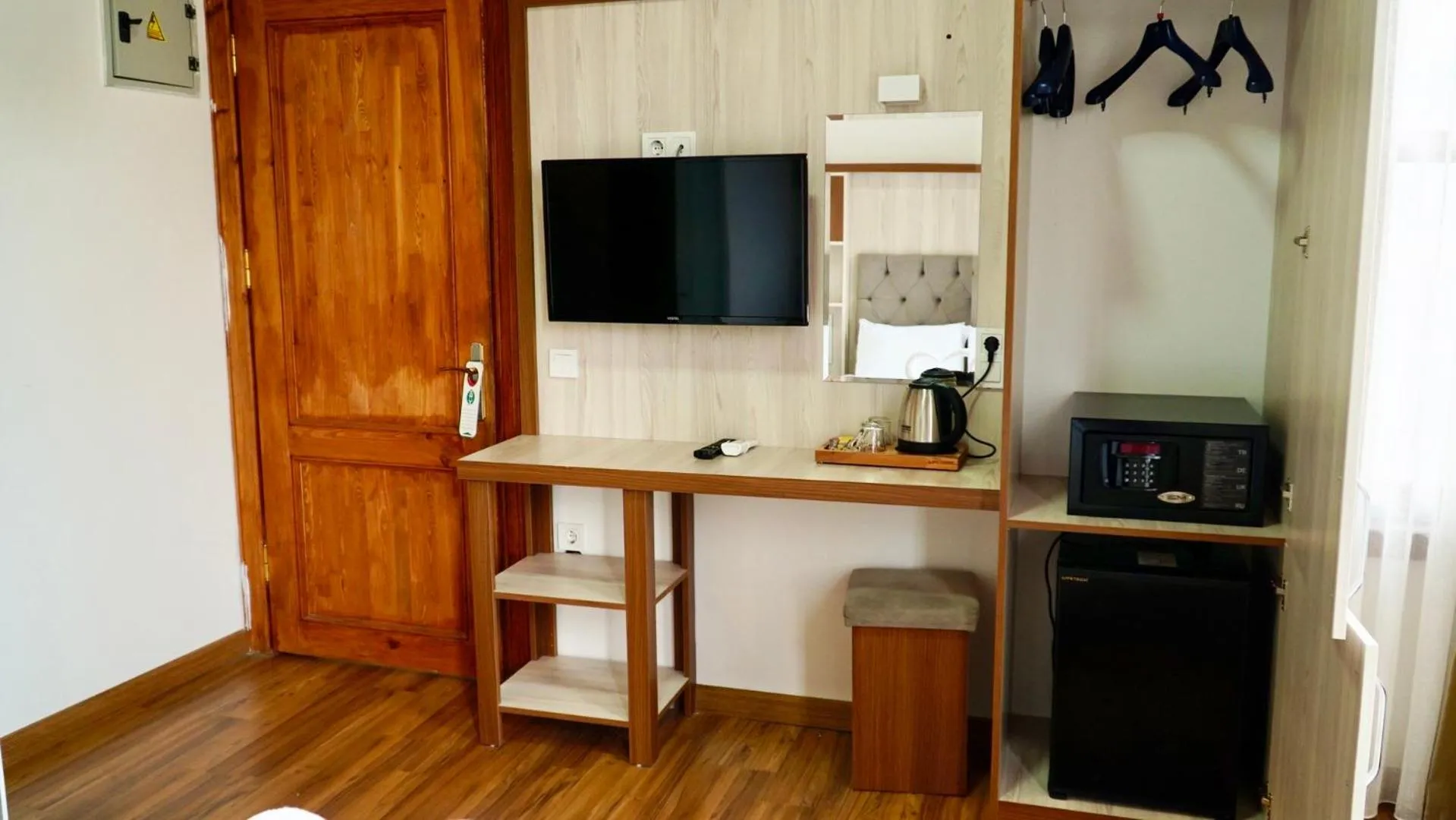 TV and multimedia in QONAQ HOTEL & SUITES