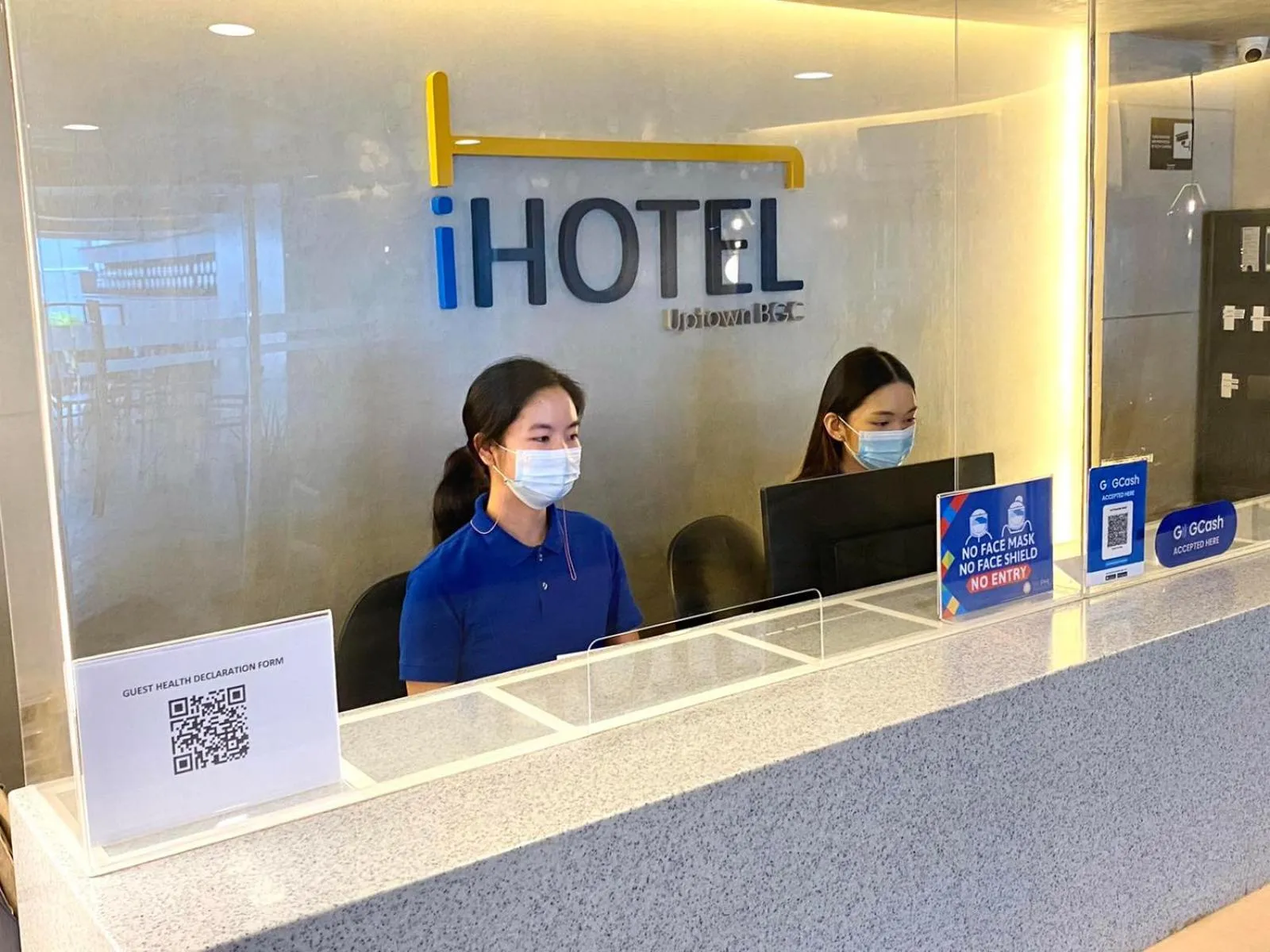 Staff in iHotel Uptown BGC