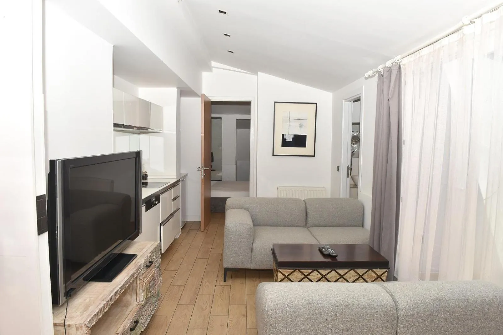 Communal lounge/ TV room in Levent Lavandula Hotel