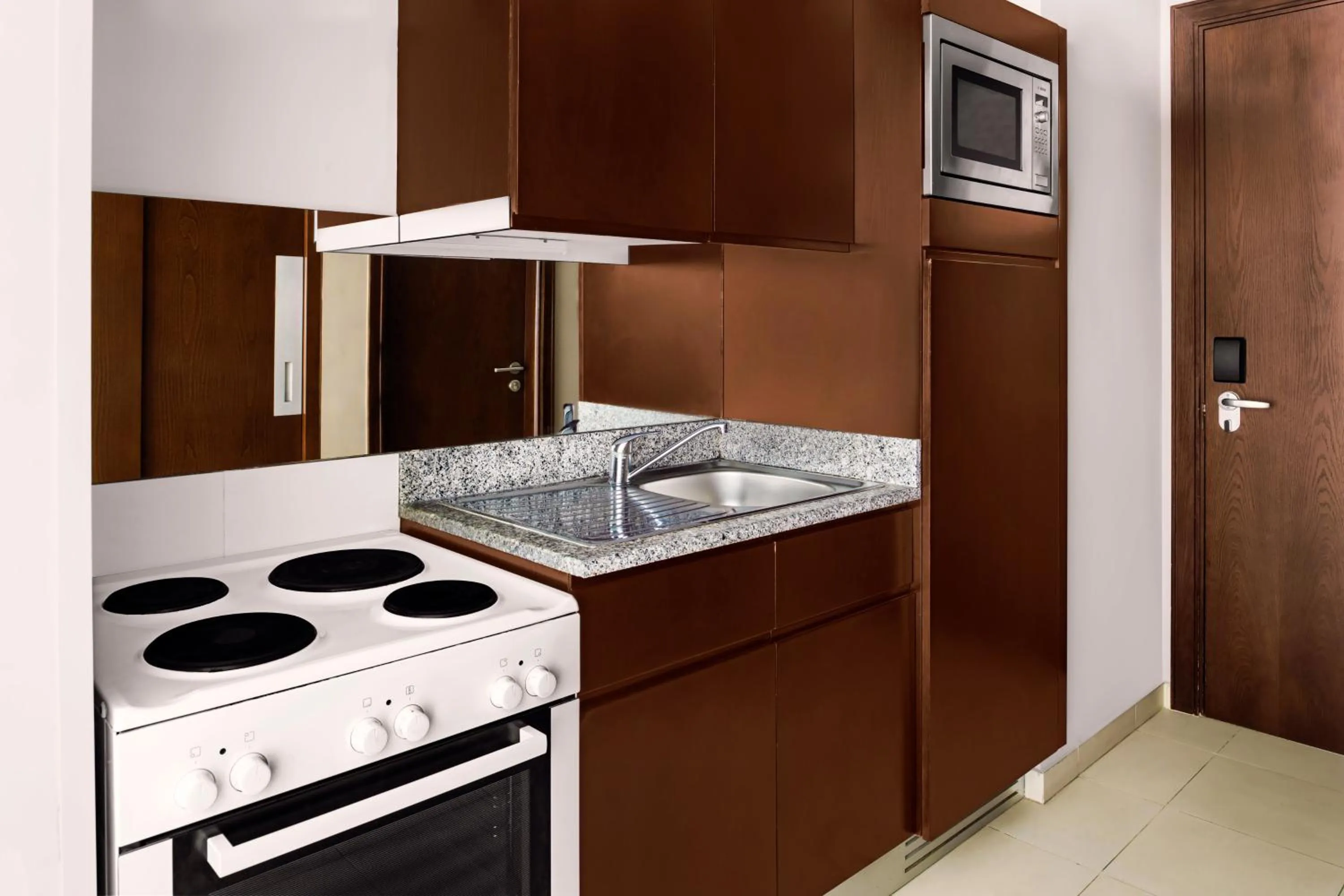 Kitchen or kitchenette in Novotel Dubai Al Barsha