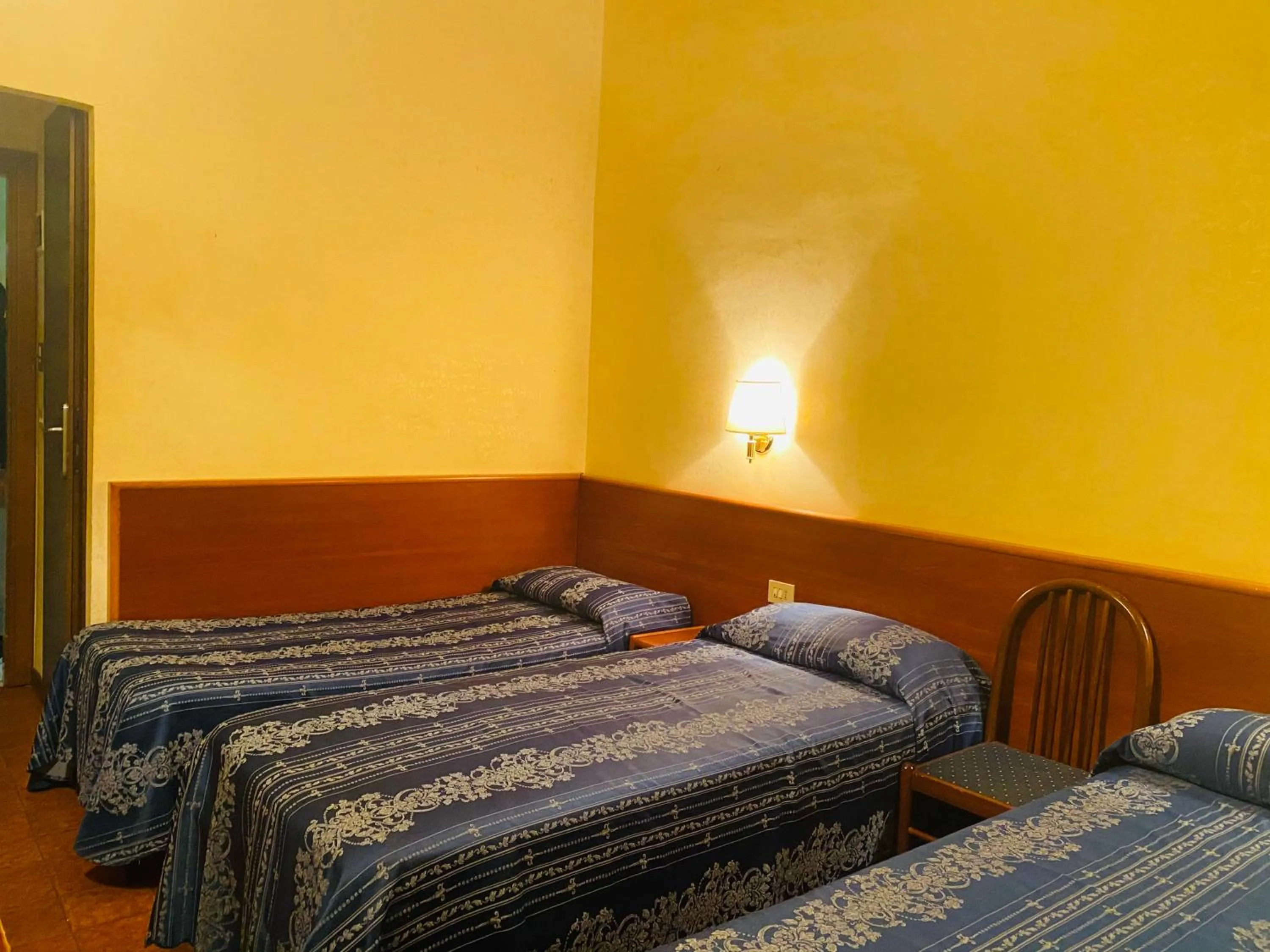 Bed in Hotel Ferrari