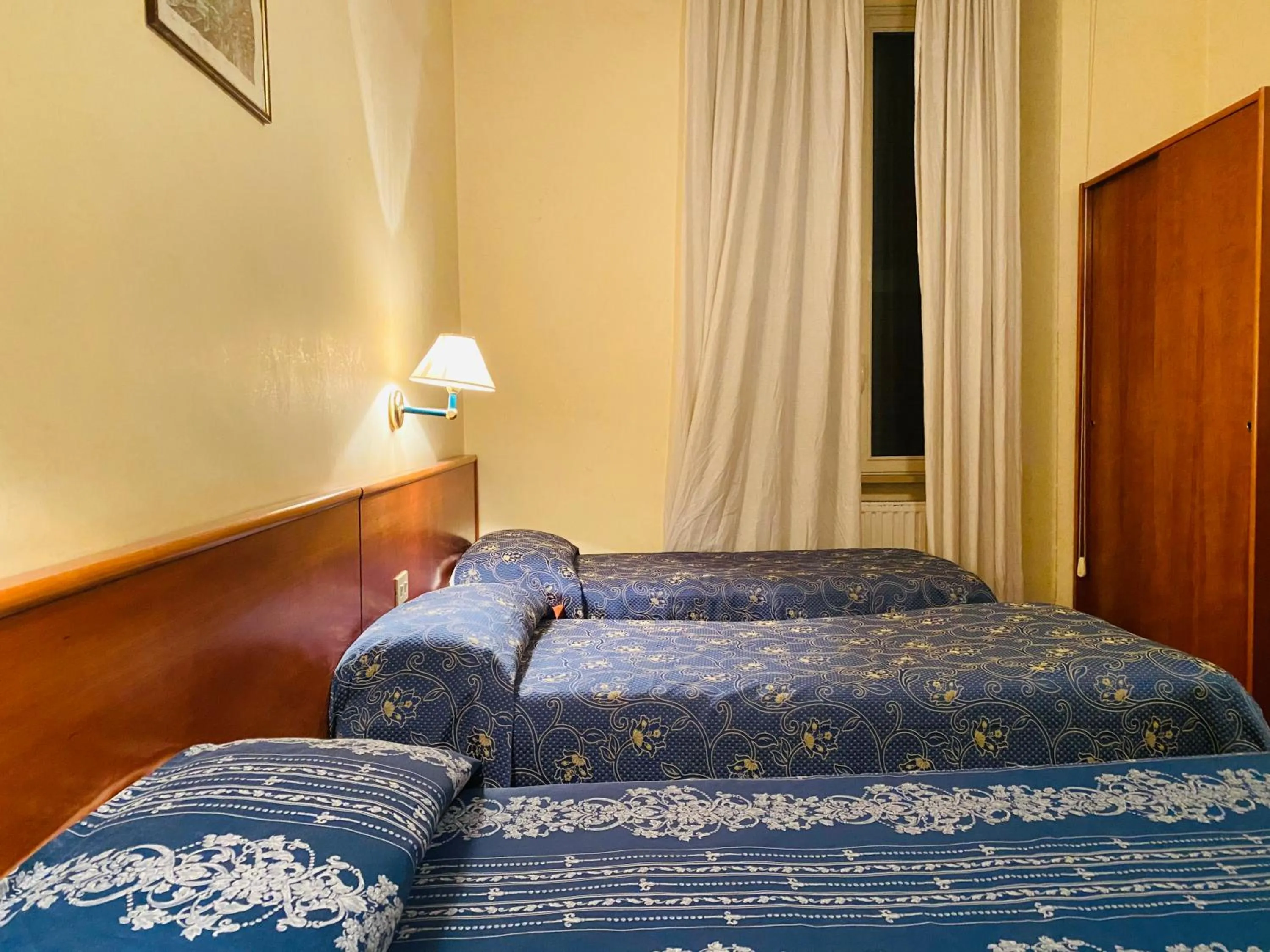 Bed in Hotel Ferrari