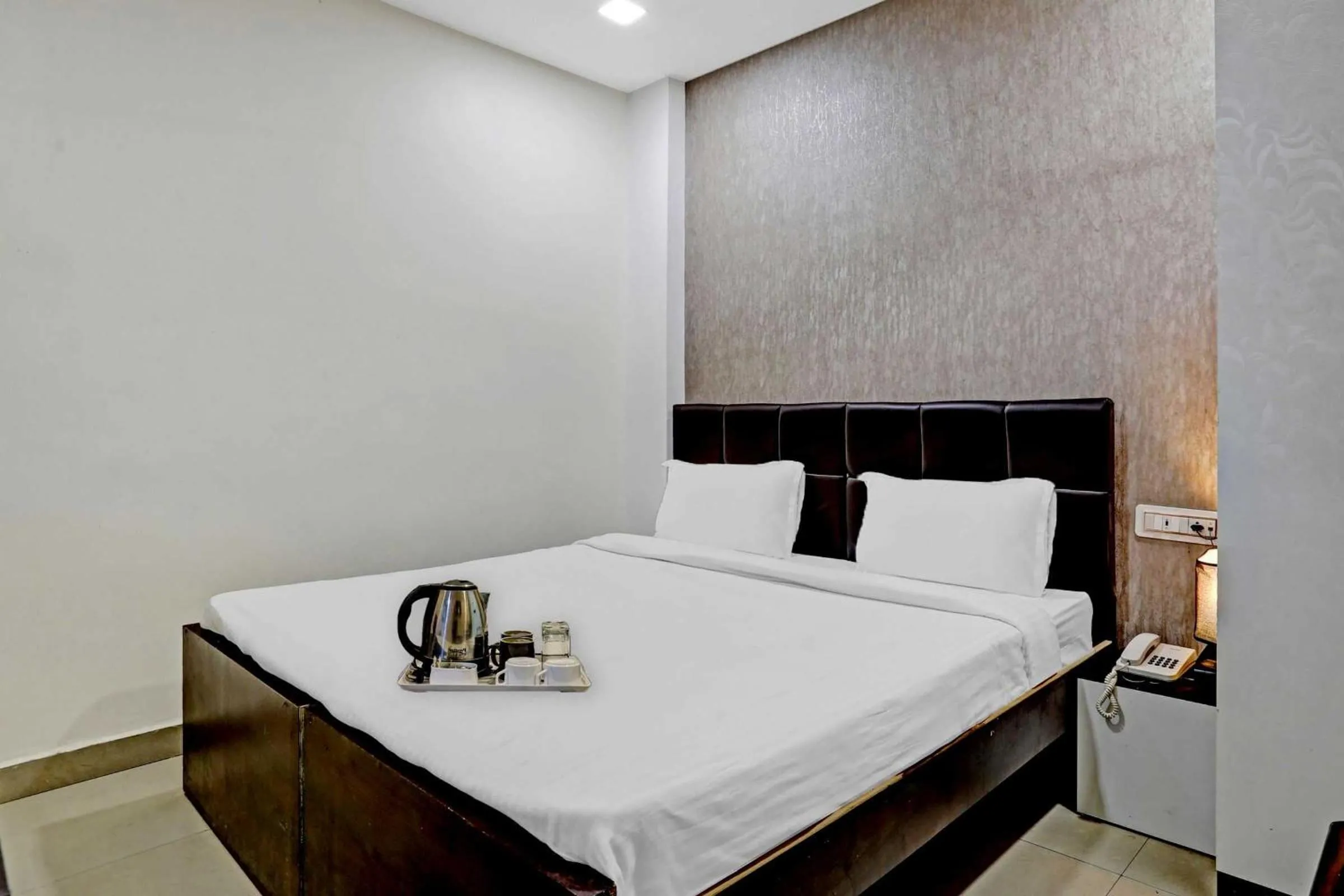 Bedroom in Hotel O Happy Stay