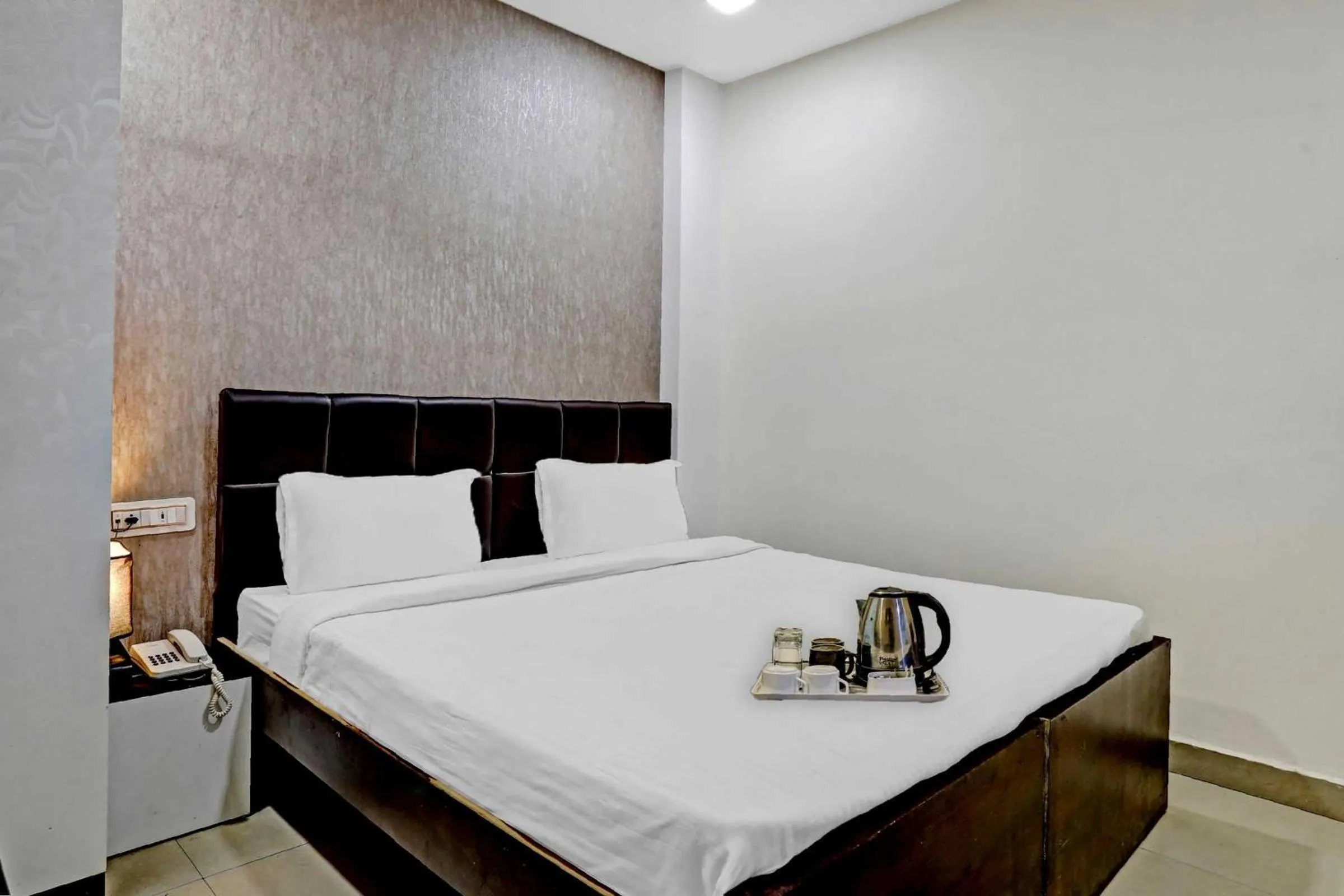 Bedroom in Hotel O Happy Stay