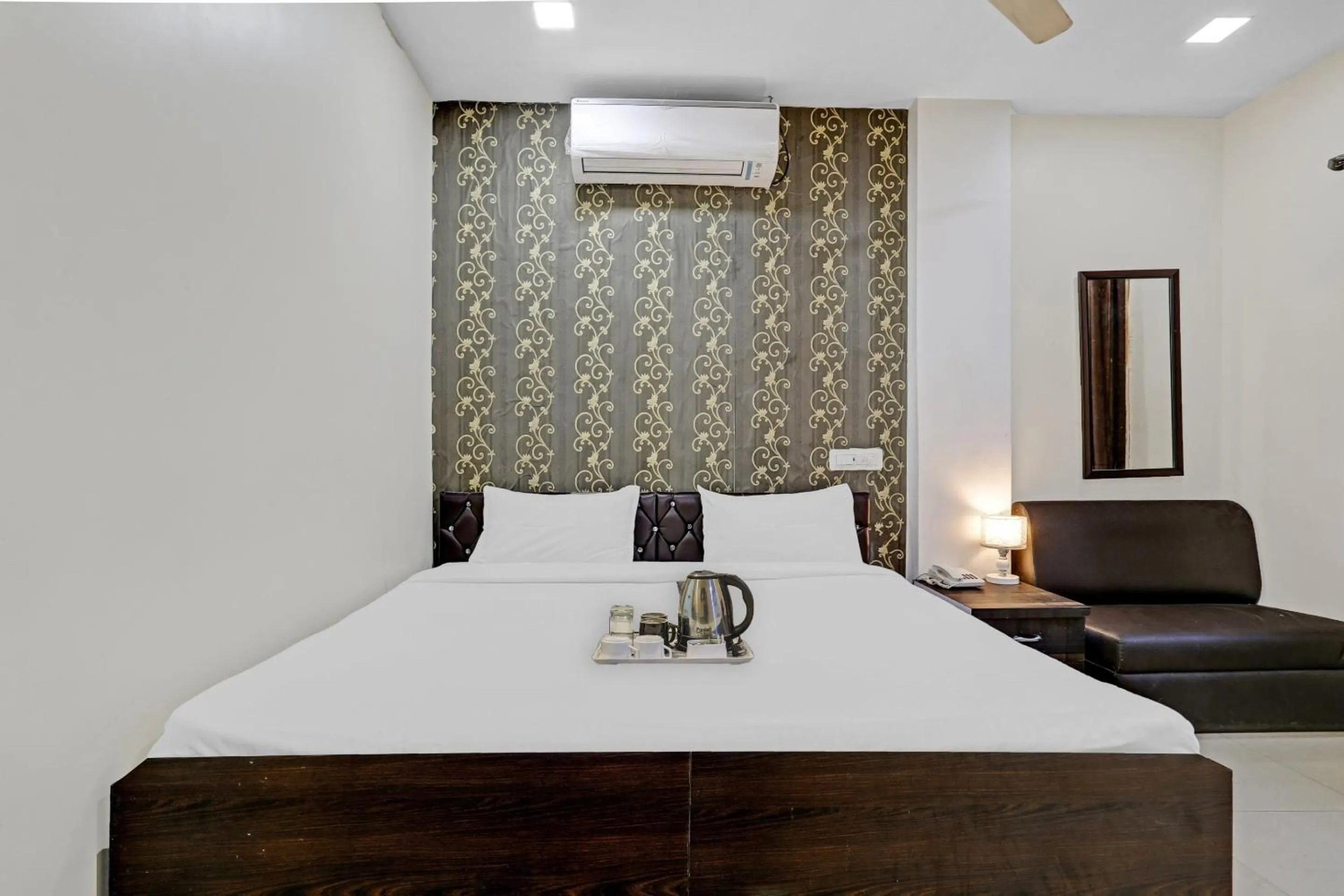 Bedroom in Hotel O Happy Stay