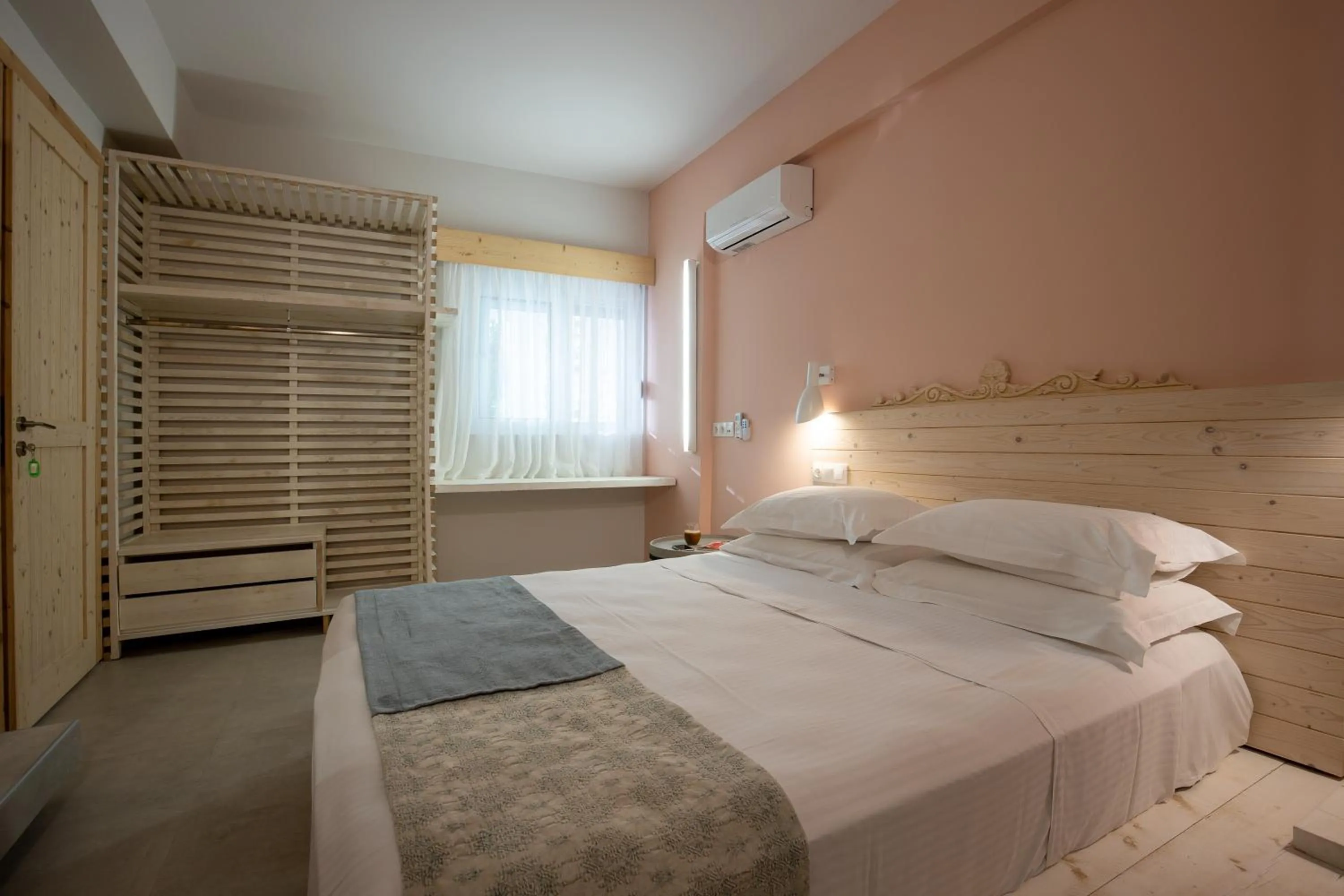 Bedroom, Bed in Kouros Exclusive Hotel & Suites - Adults Only