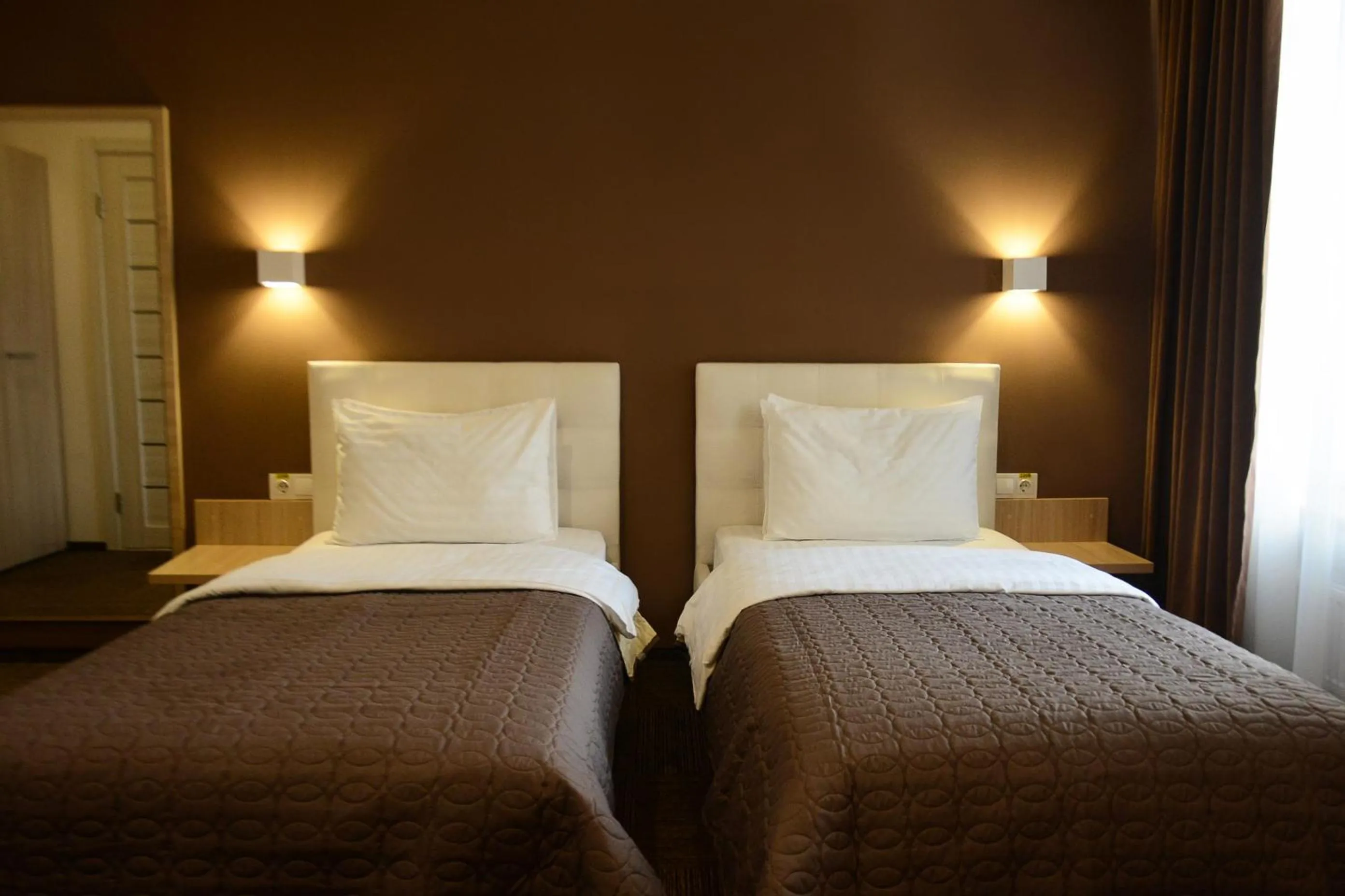 Bed in Hotel Voskresensky