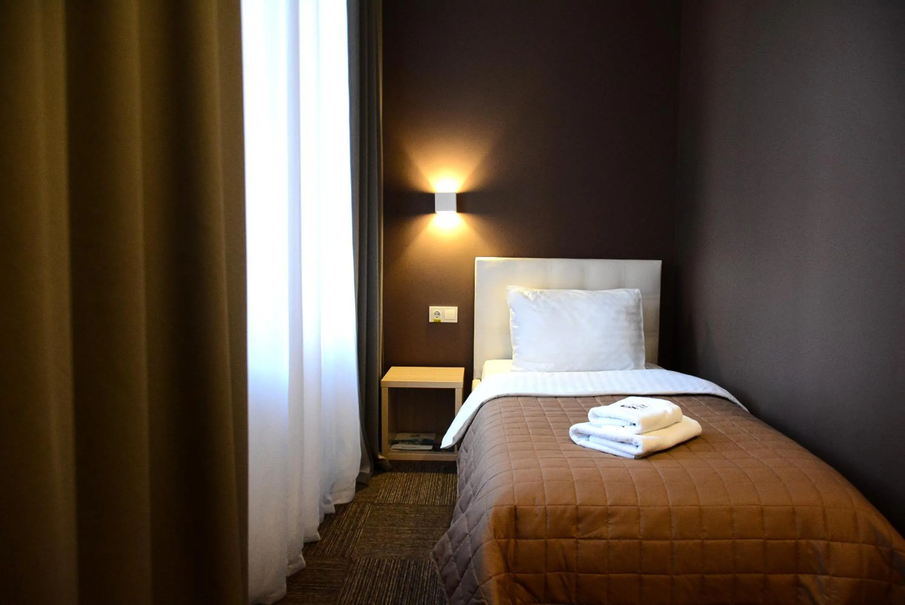 Bed in Hotel Voskresensky