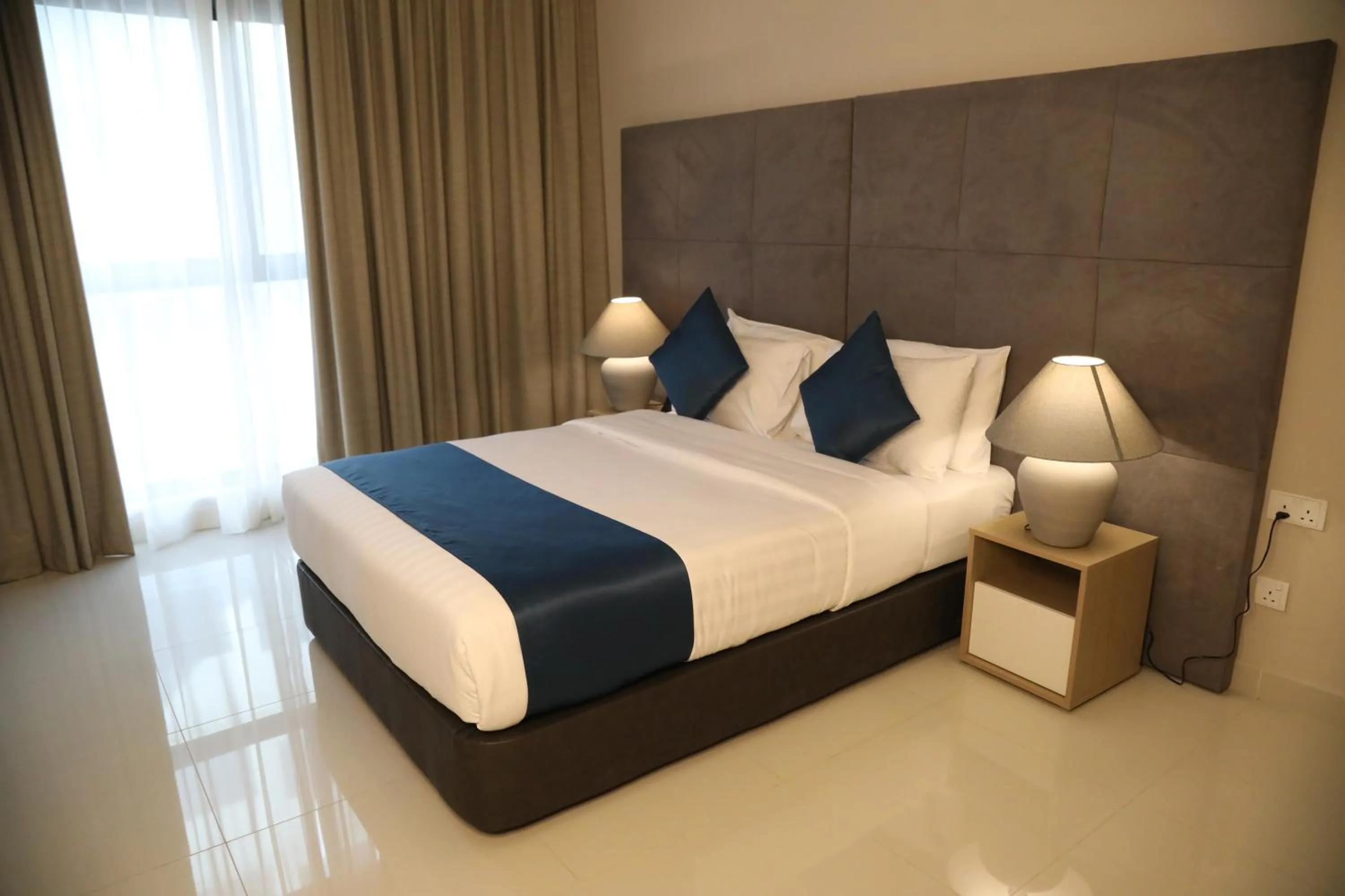 Bed in Sunday Luxury Downtown Adliya Formerly Jewel Hotel