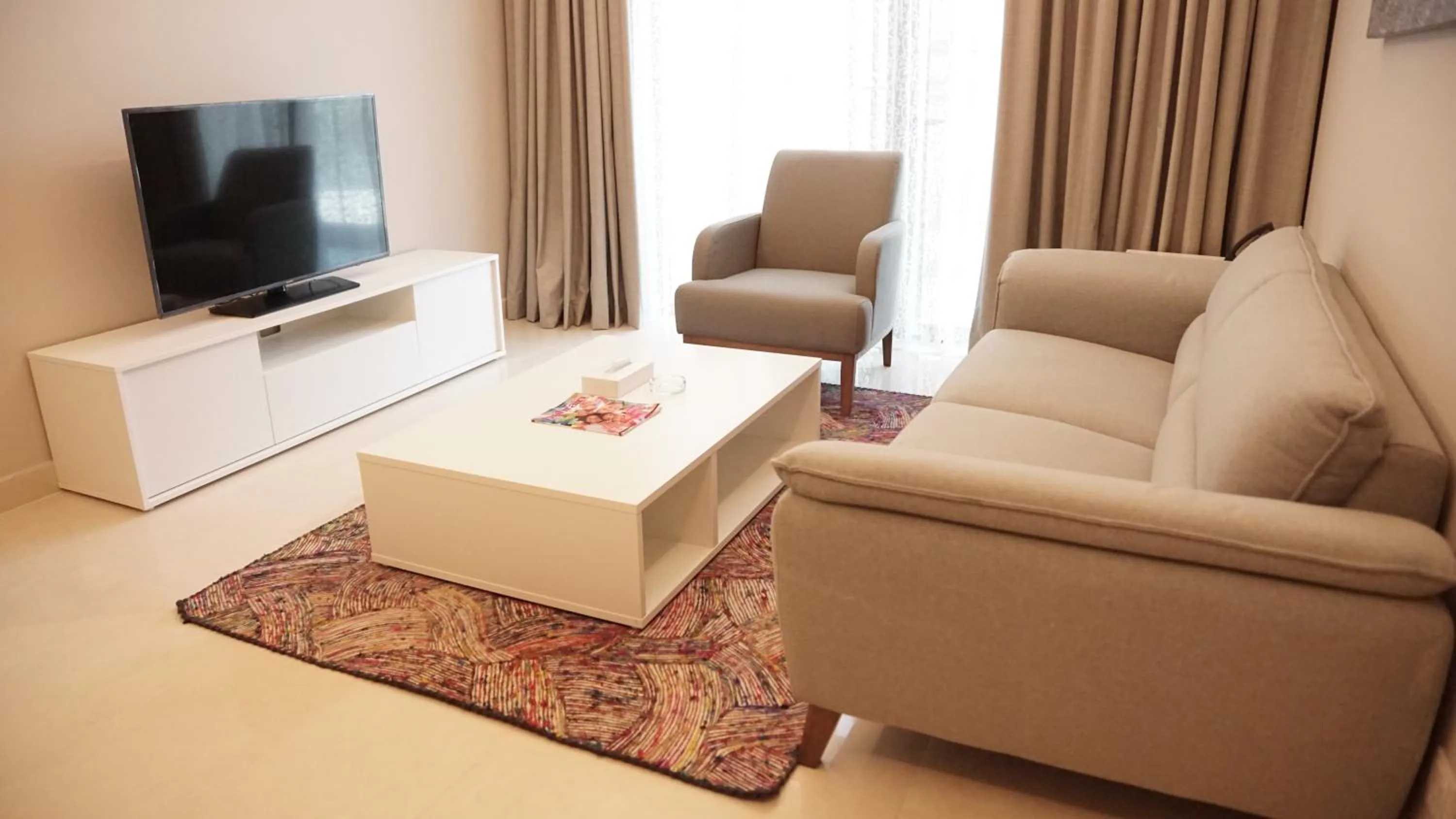 Seating area in Sunday Luxury Downtown Adliya Formerly Jewel Hotel