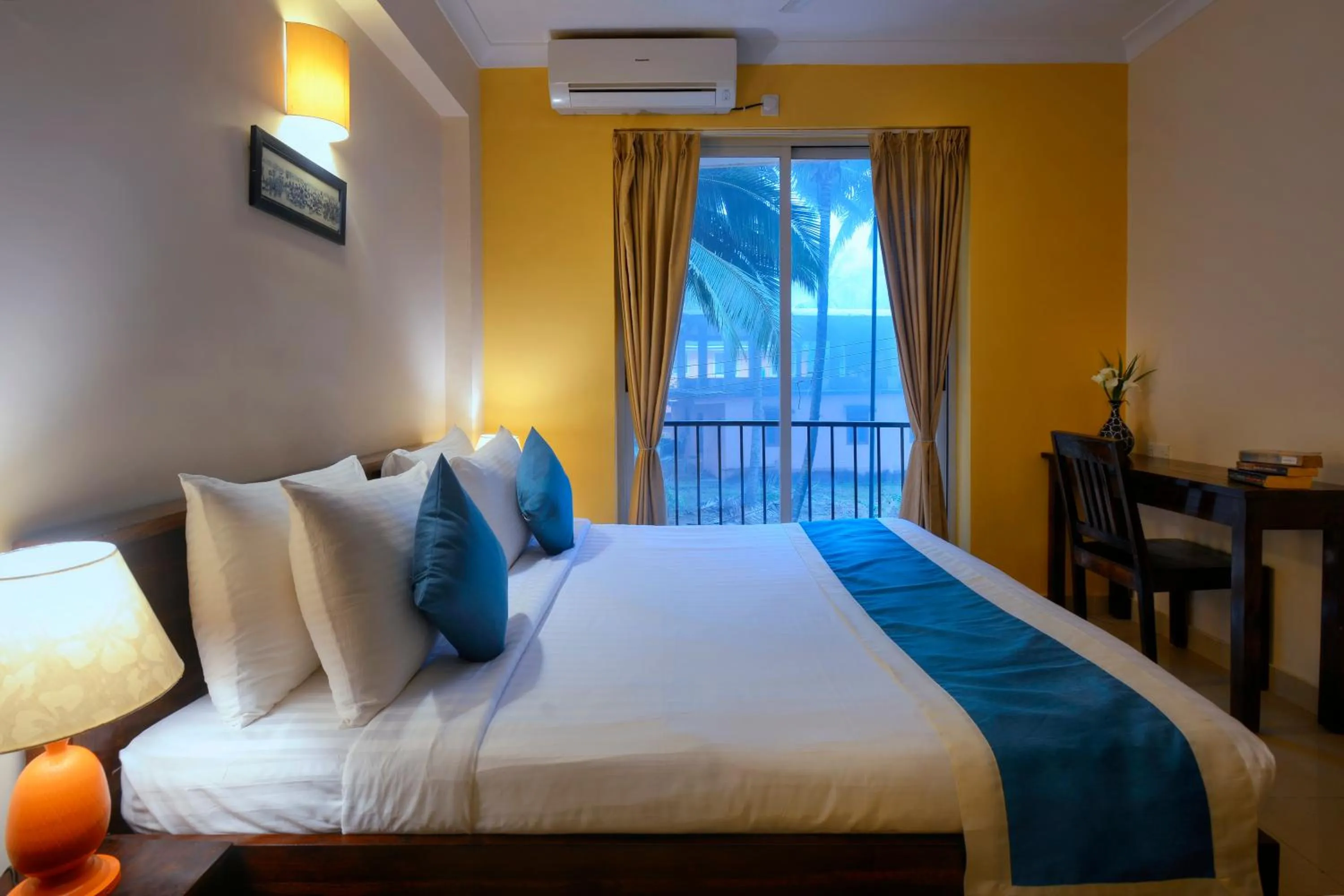 Bed in TreeHouse Blue Hotel & Serviced Apartments