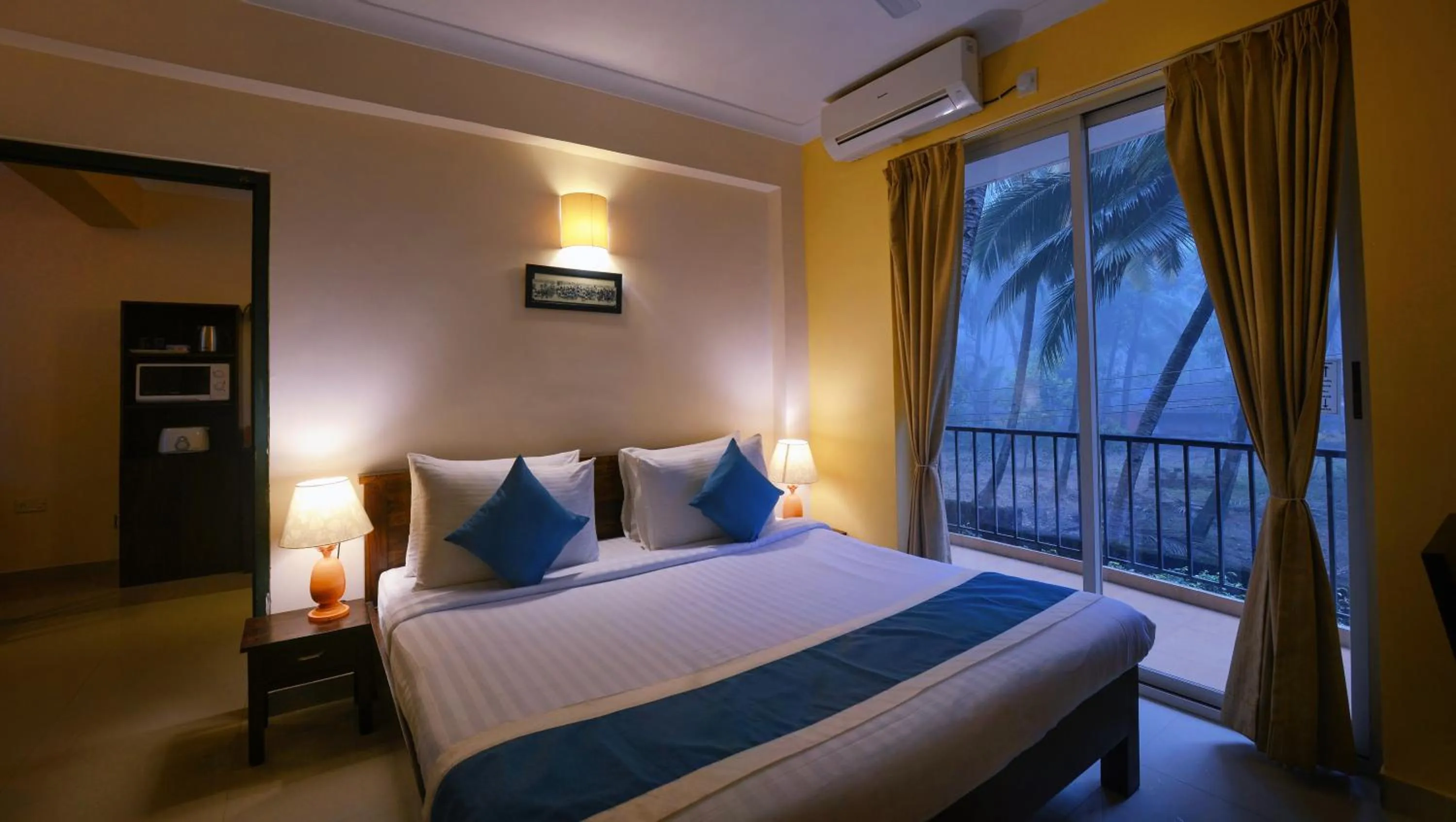 Bed in TreeHouse Blue Hotel & Serviced Apartments