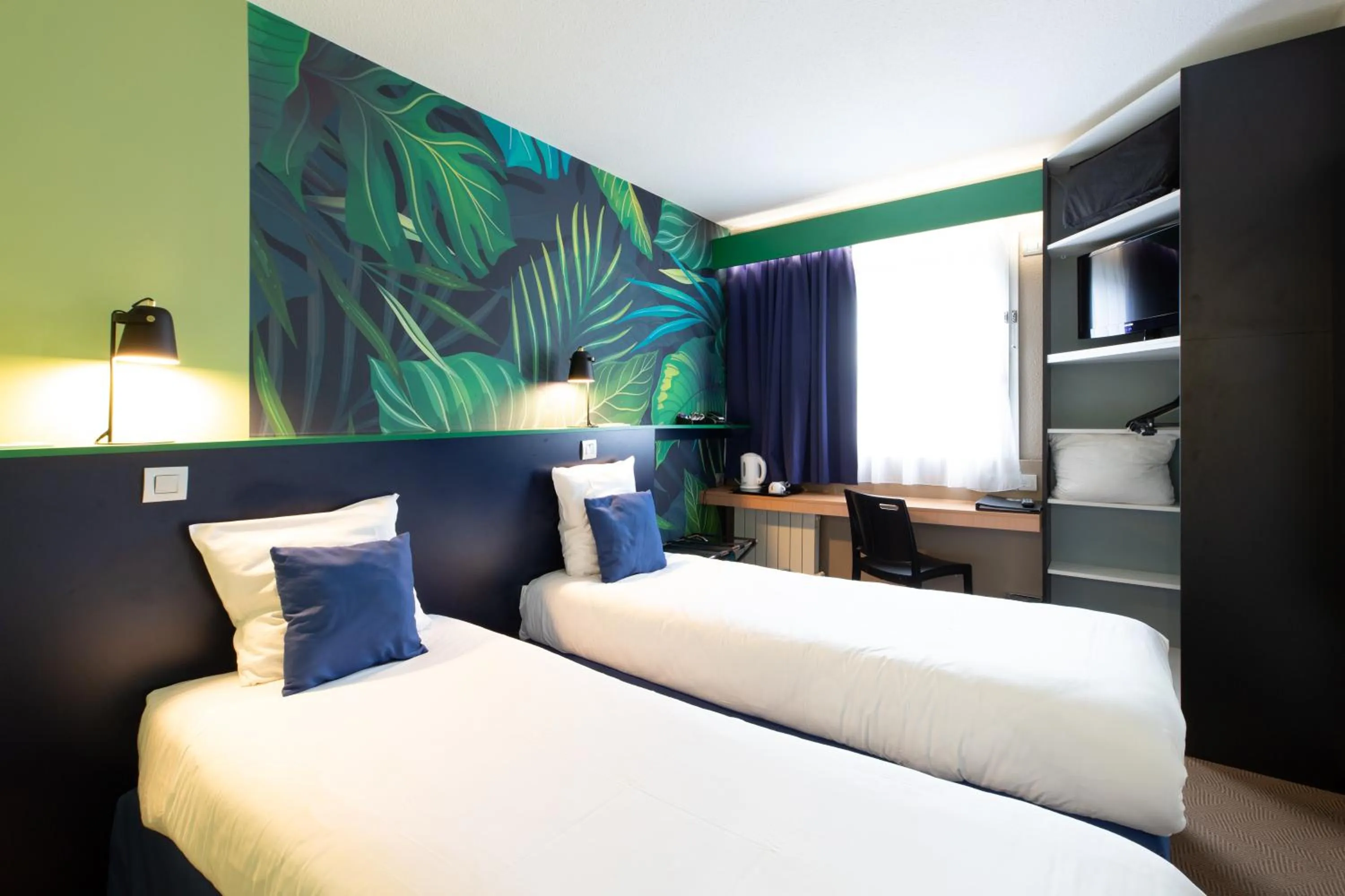 Bed in Logis Hôtel du Haut-Bugey