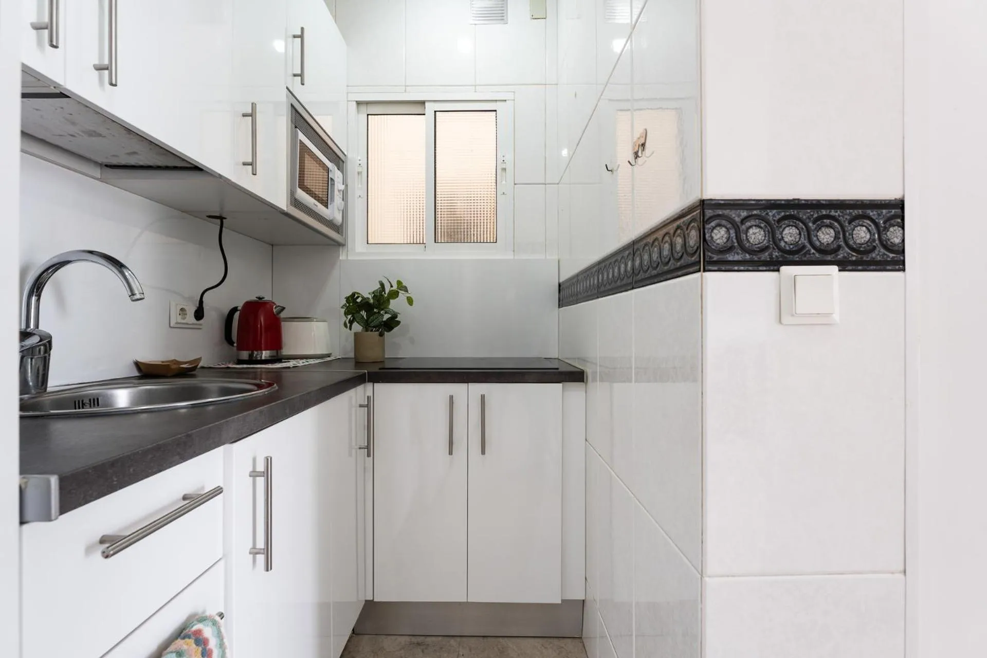 Kitchen or kitchenette in MalagaSuite Benalmadena Relax & Sun