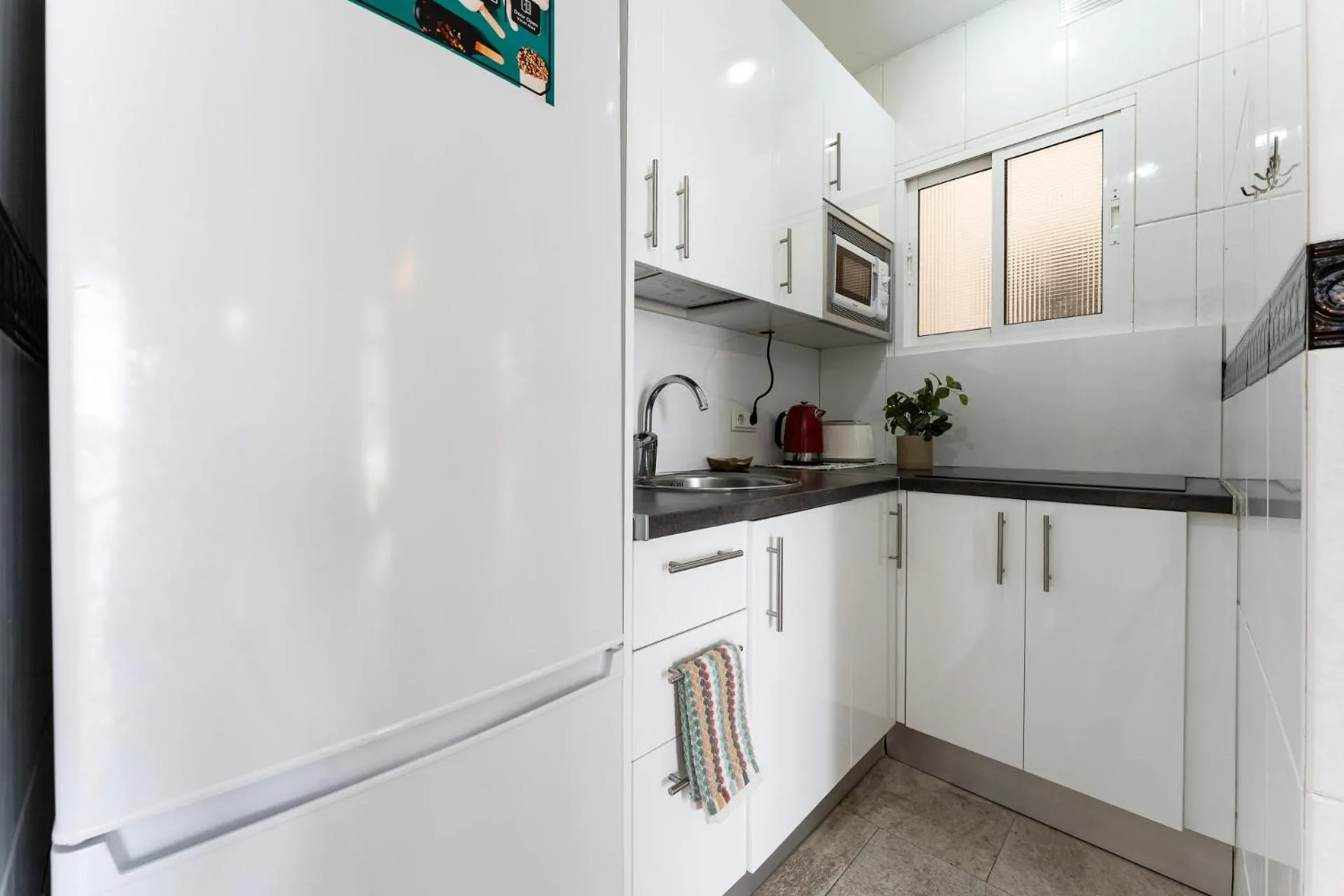 Kitchen or kitchenette in MalagaSuite Benalmadena Relax & Sun