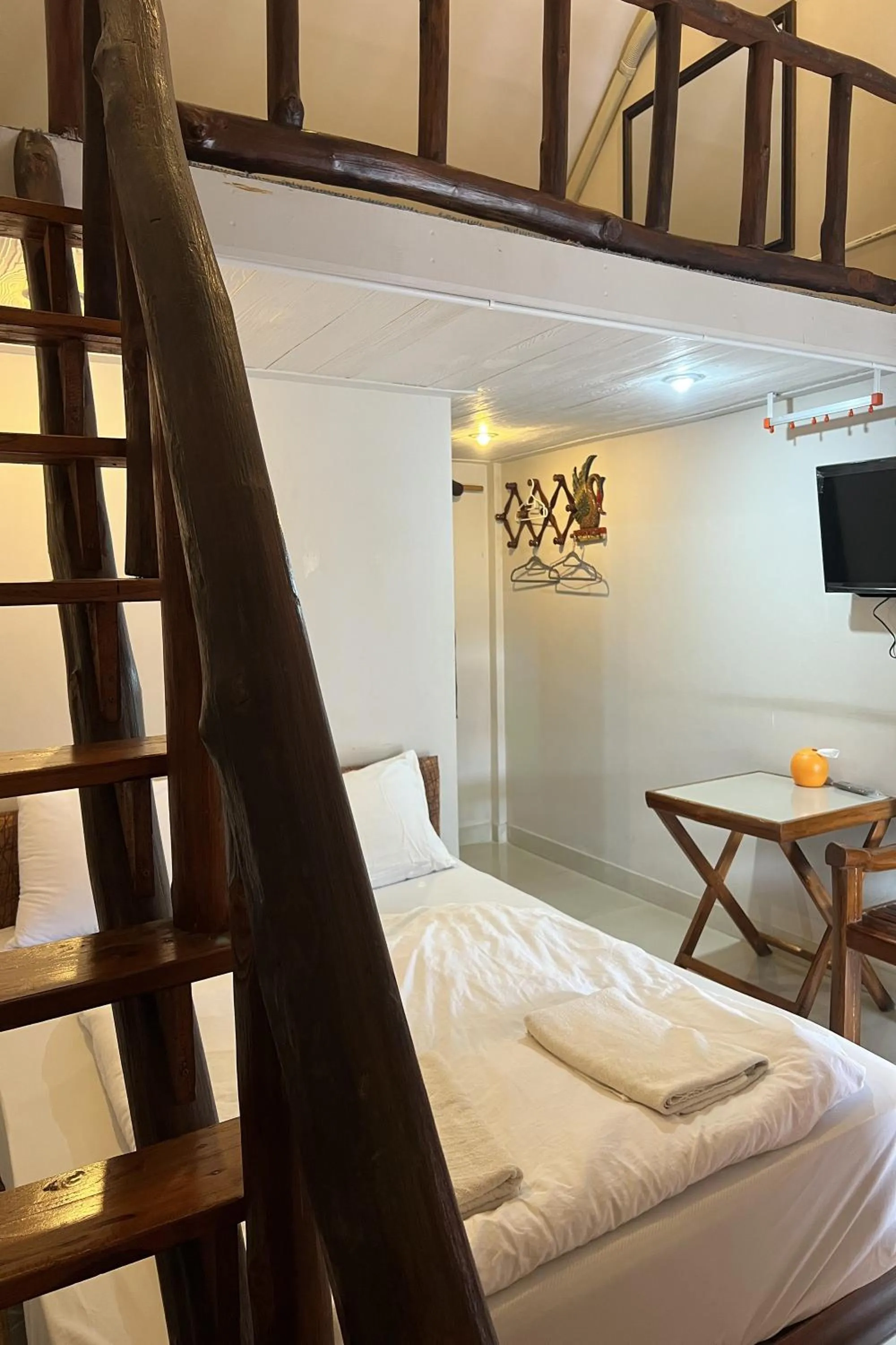 Bed in Baan Lanna Resort