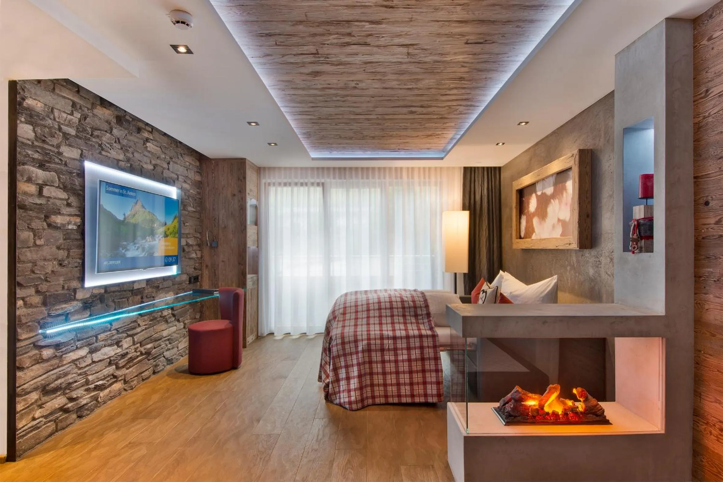 Photo of the whole room, Bed in PETE Alpine Boutique Hotel - klein und fein - Private SPA Suiten und Zimmer