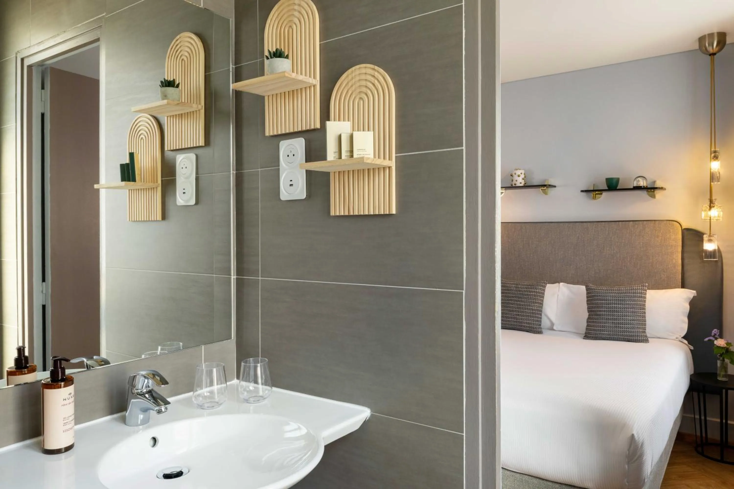 Bed in Hôtel Eiffel Saint Charles