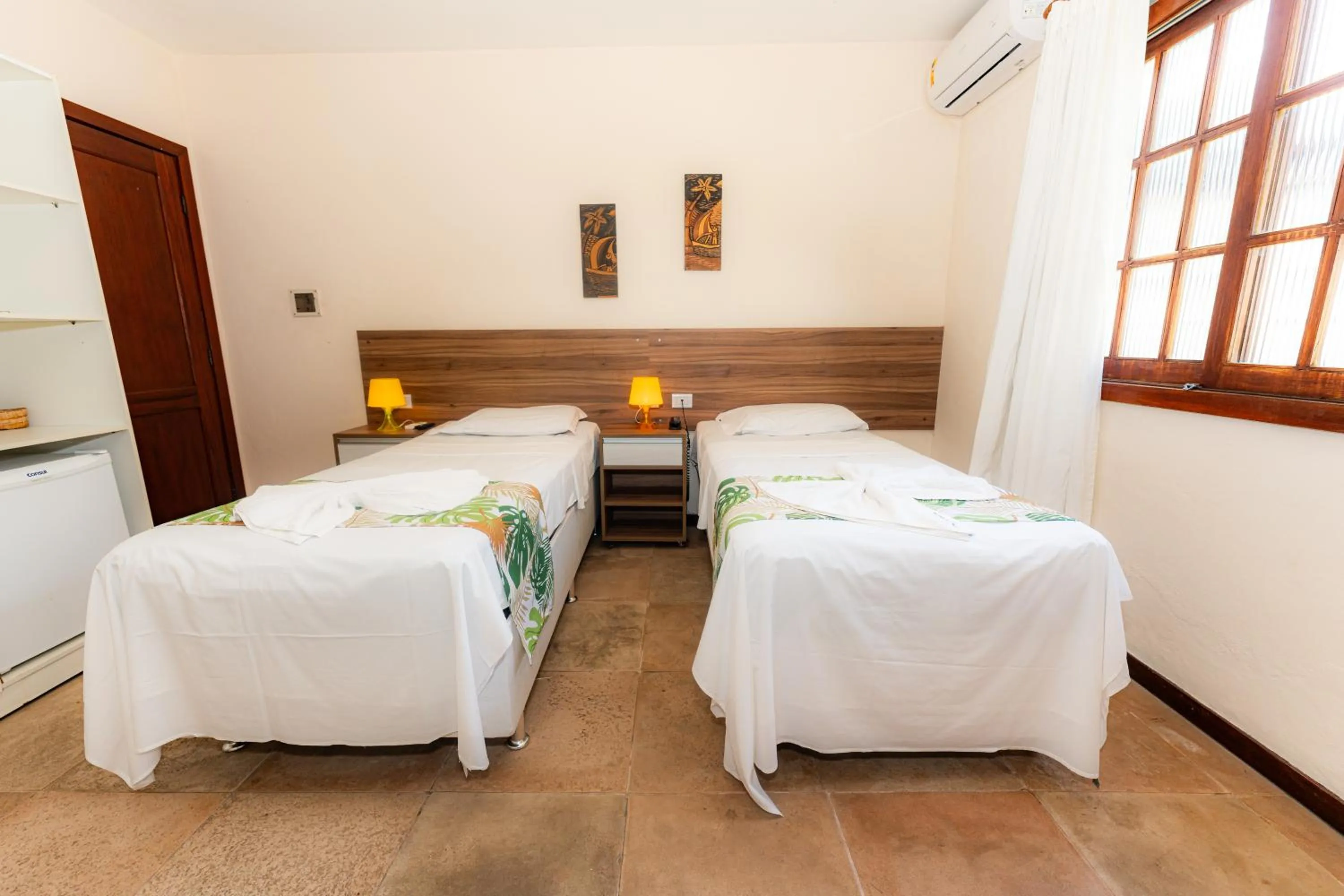 Bed in Hotel Pousada Salvador Paradise