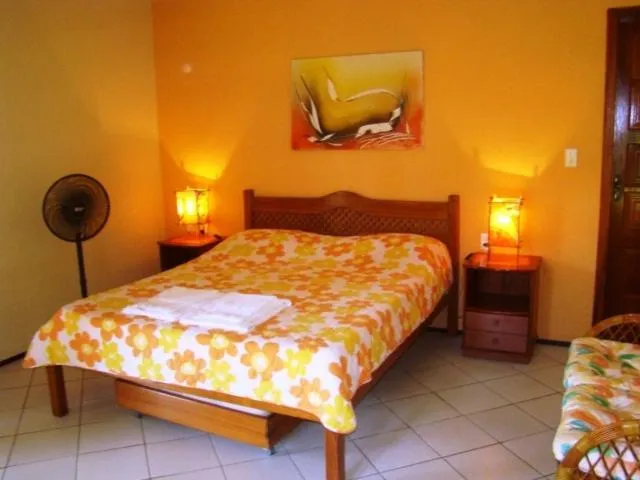 Bed in Pousada Casa Dona Rosa