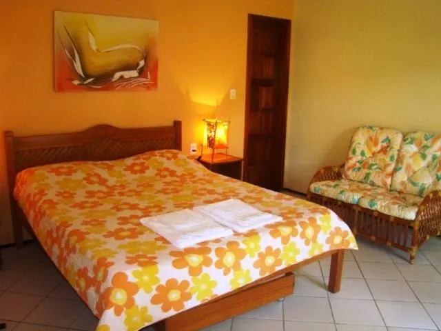 Bed in Pousada Casa Dona Rosa