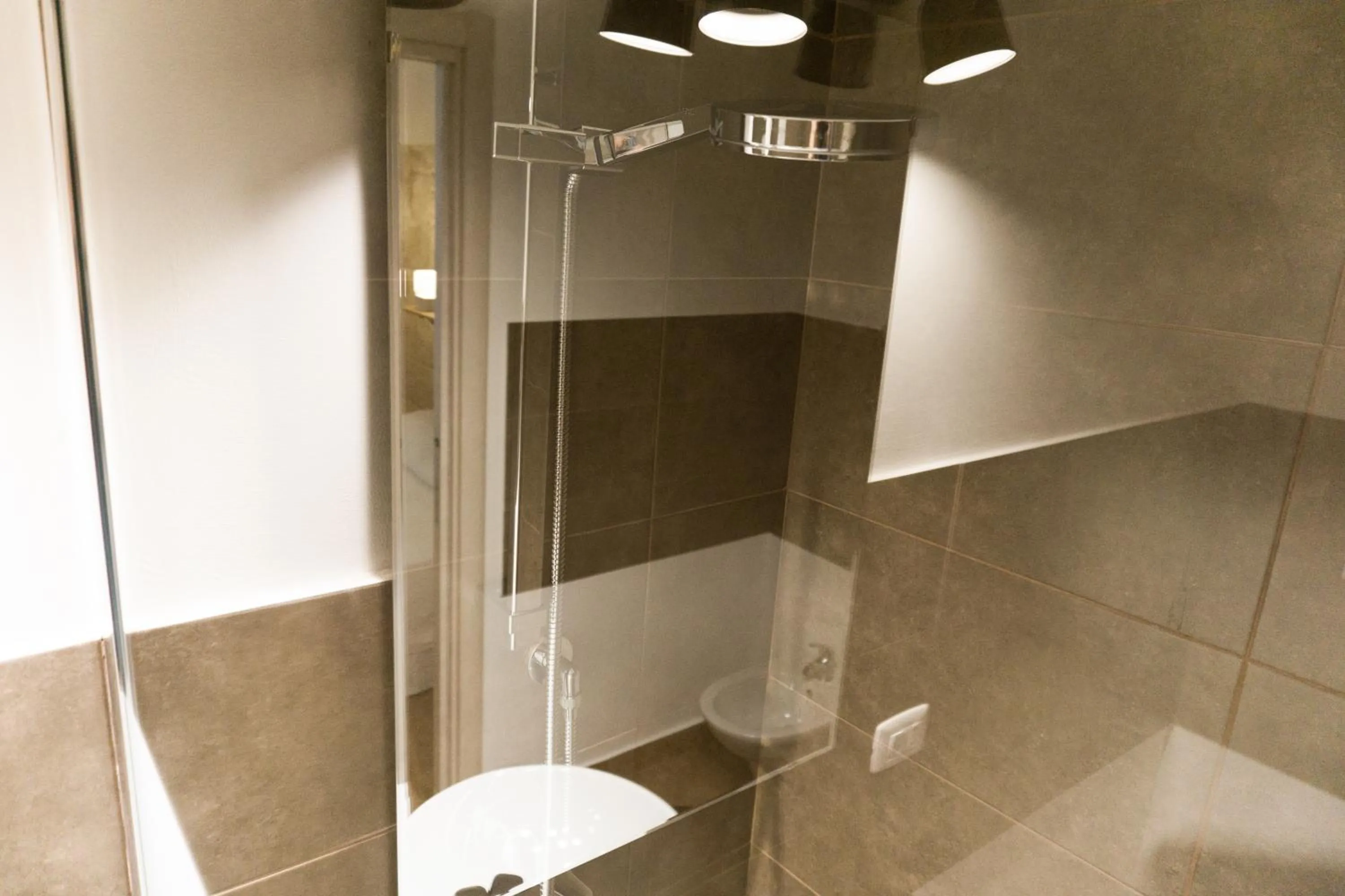 Bathroom in Donato Rooms