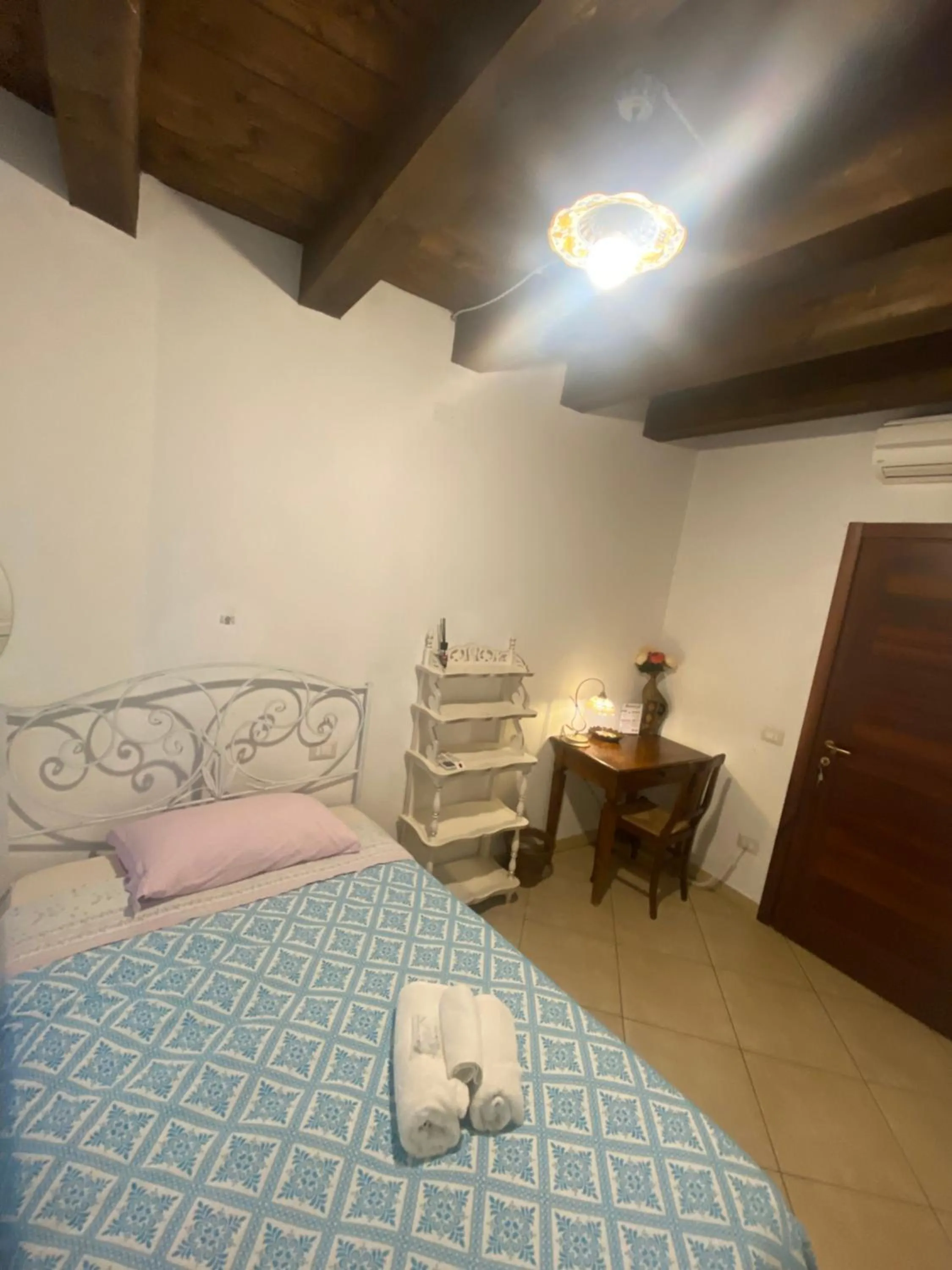 Bed in L'Antica Torre Caralis Holiday