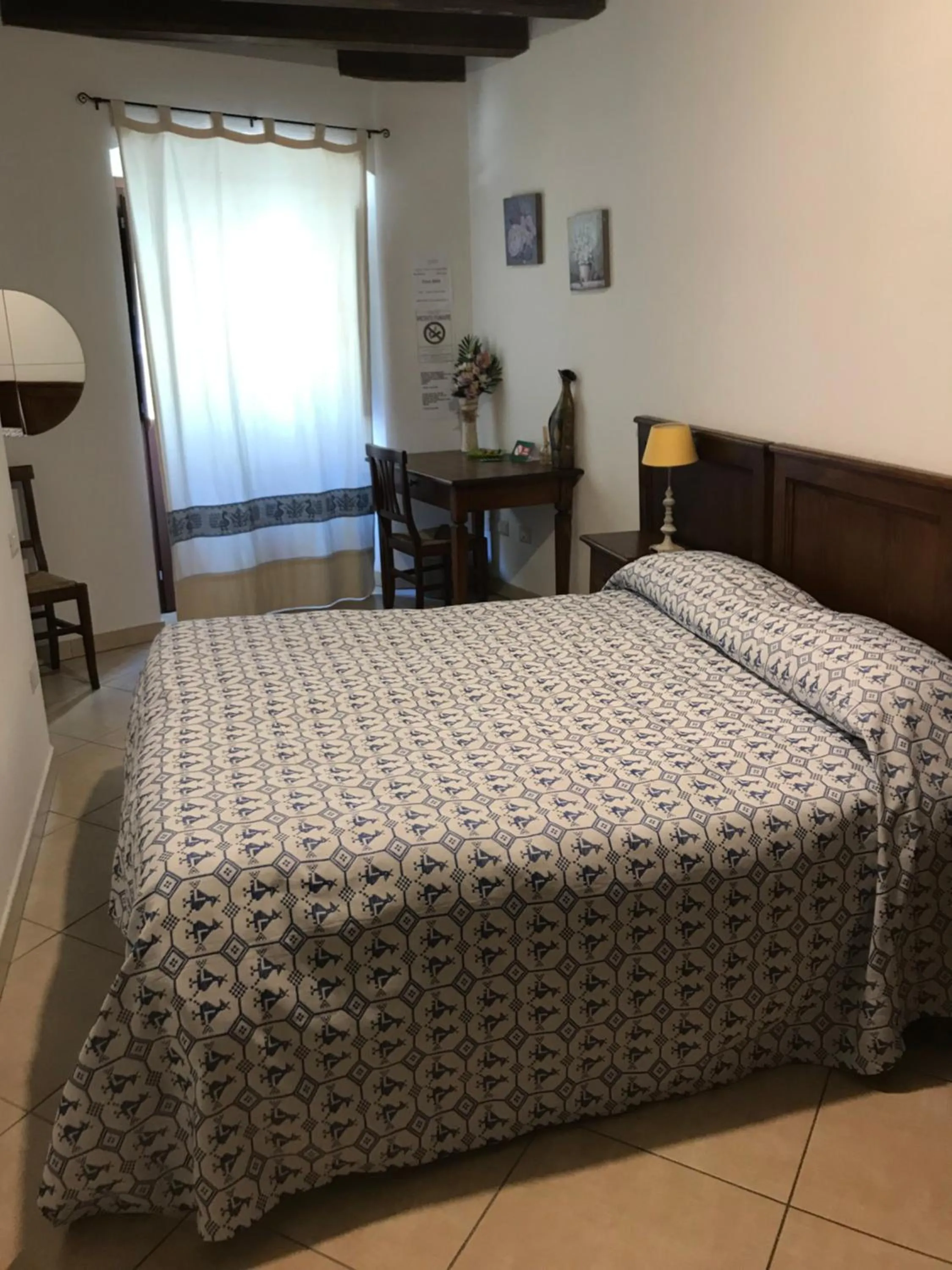 Bed in L'Antica Torre Caralis Holiday