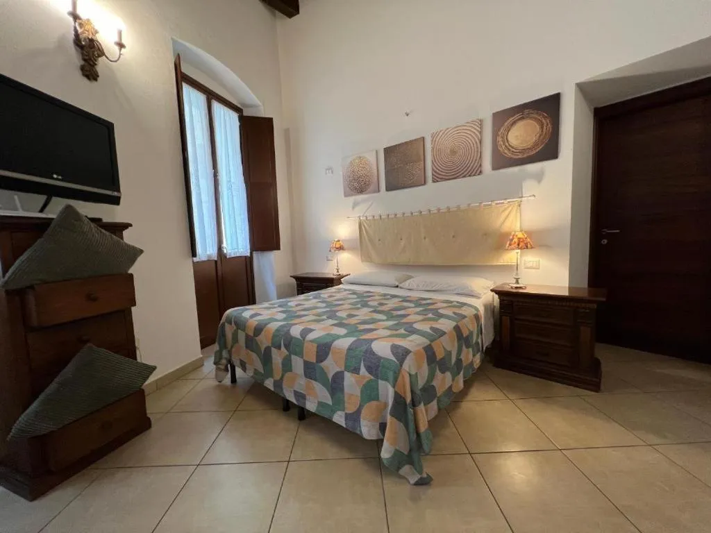 Bed in L'Antica Torre Caralis Holiday