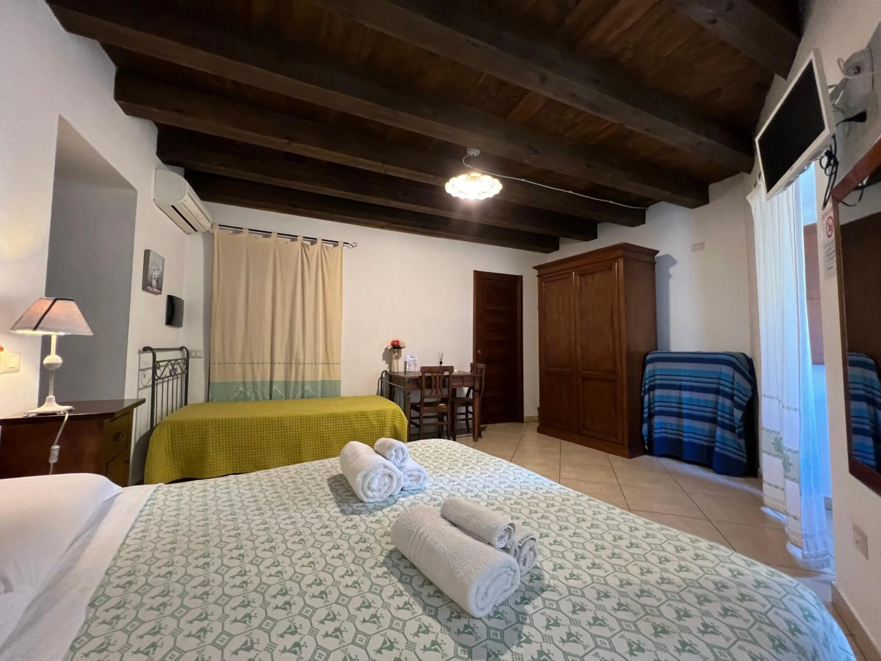 Bed in L'Antica Torre Caralis Holiday