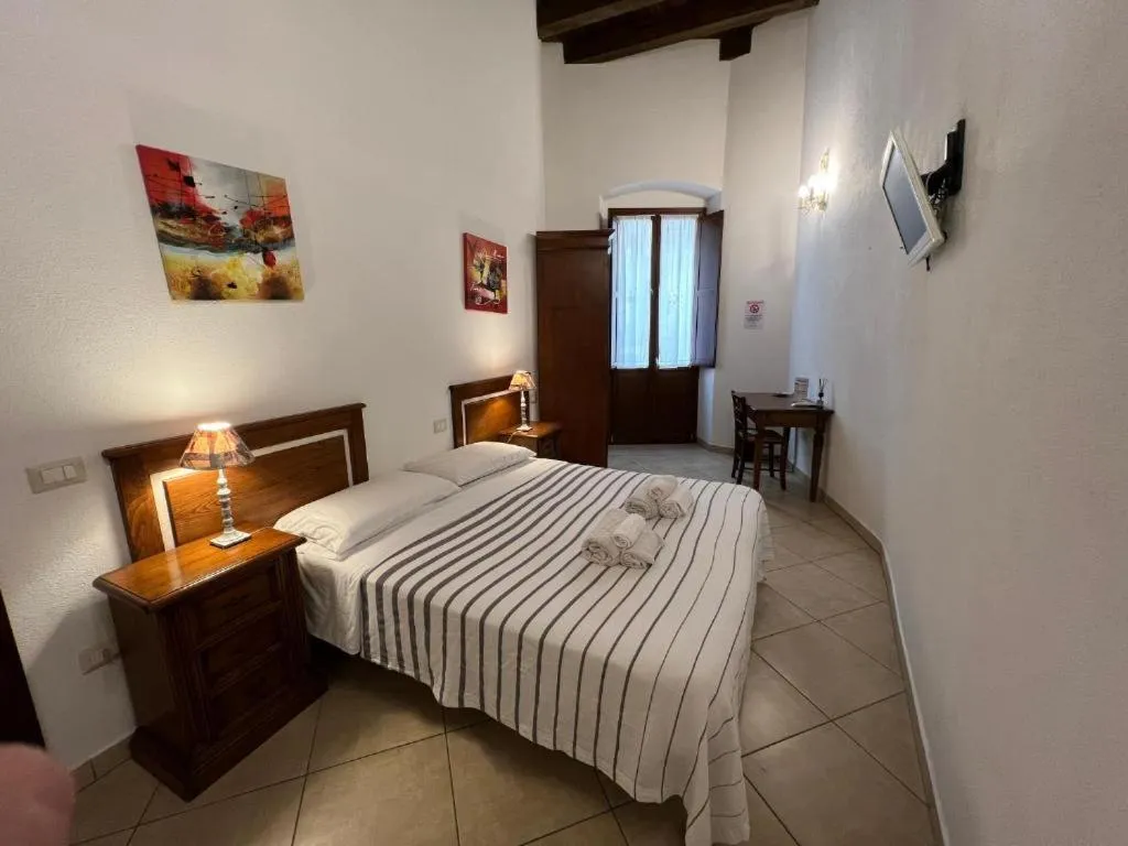 Bed in L'Antica Torre Caralis Holiday