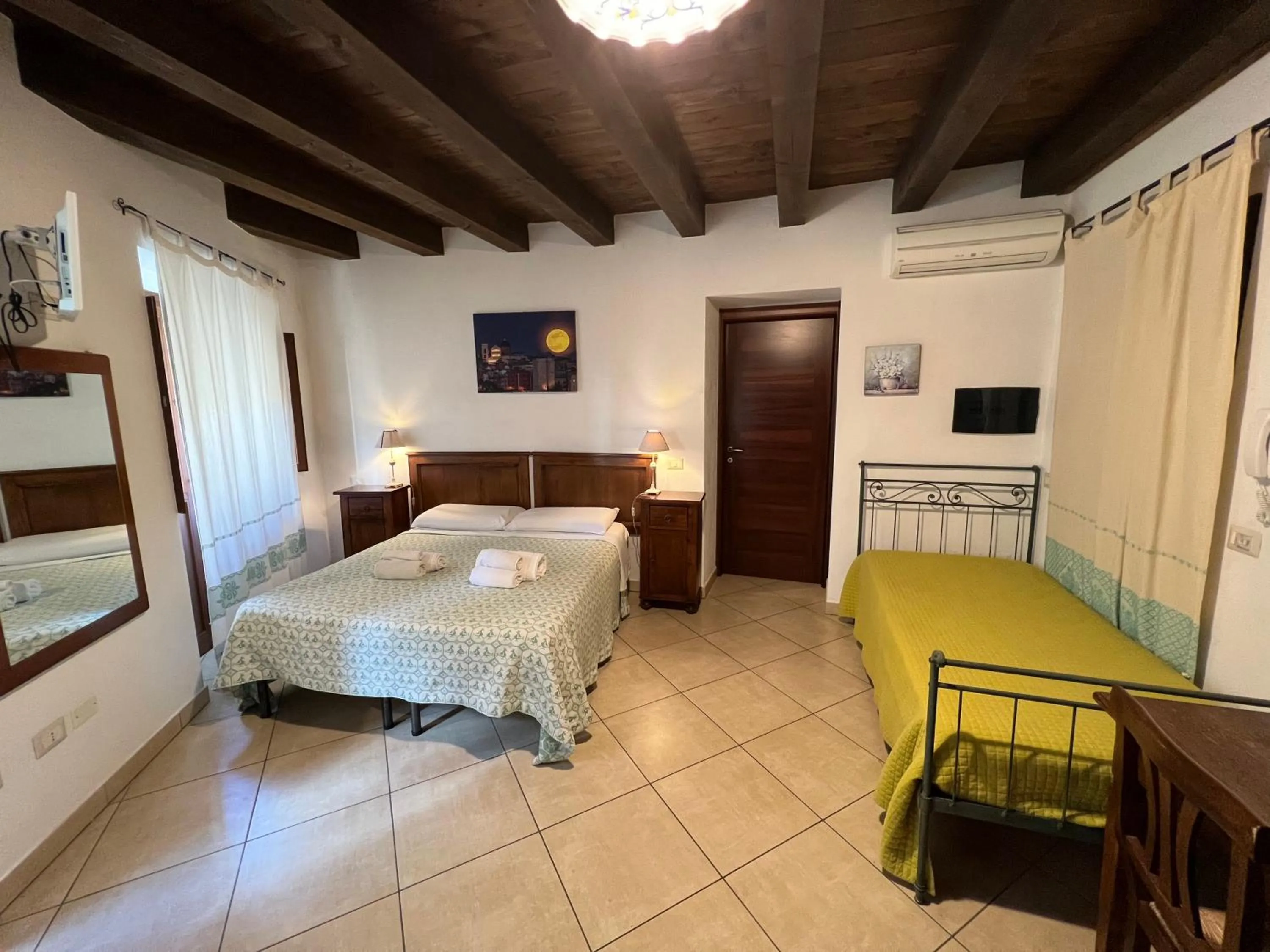 Bed in L'Antica Torre Caralis Holiday
