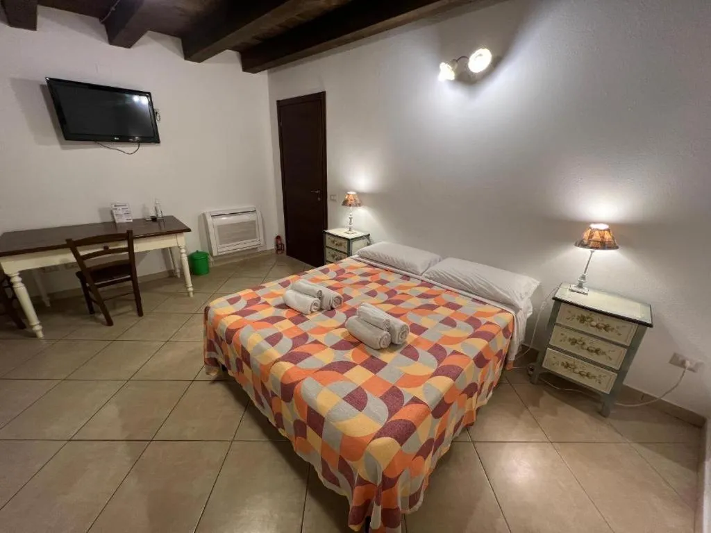 Bed in L'Antica Torre Caralis Holiday