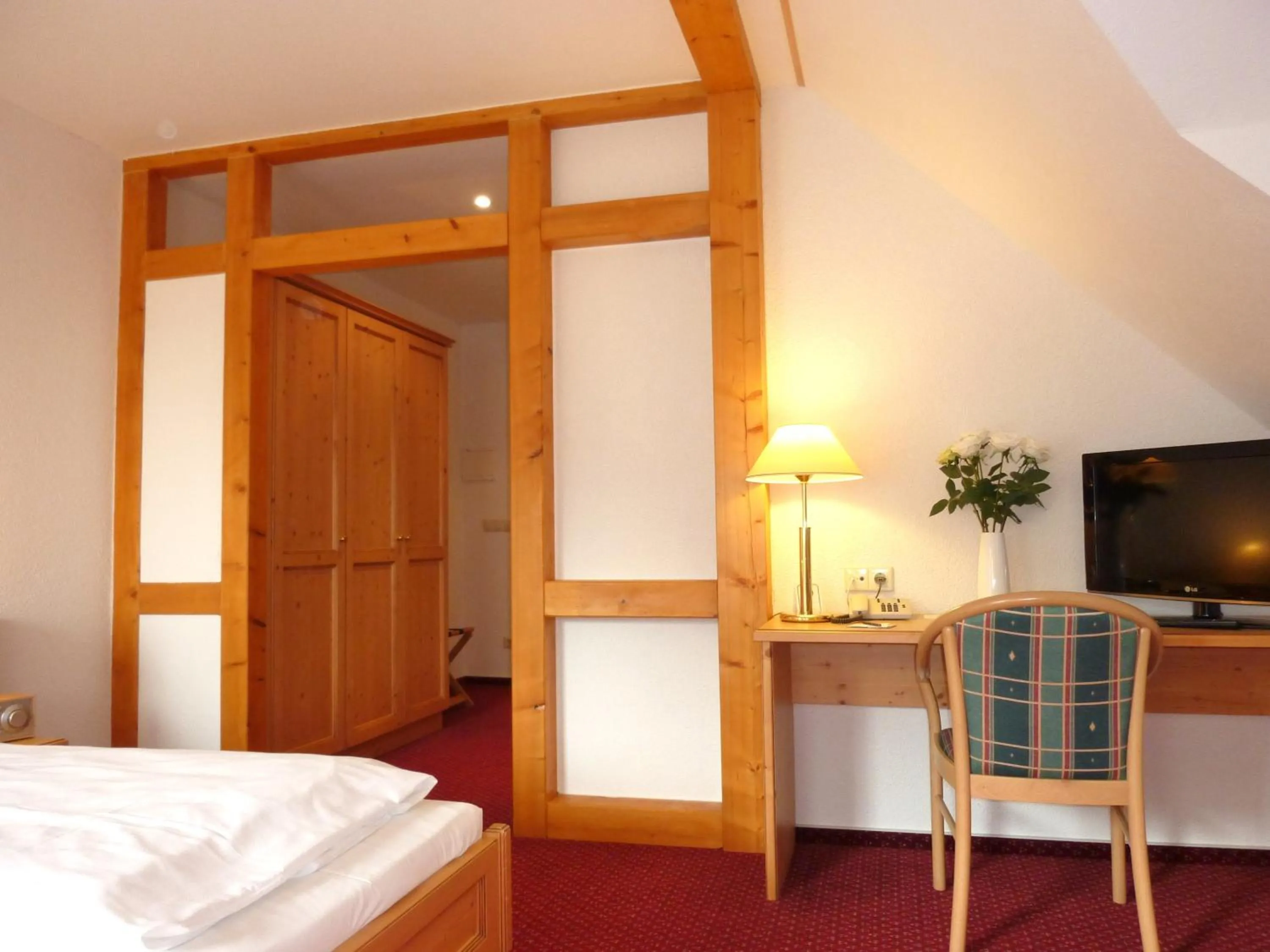 Bed in Landhaus Müritzgarten Hotel garni