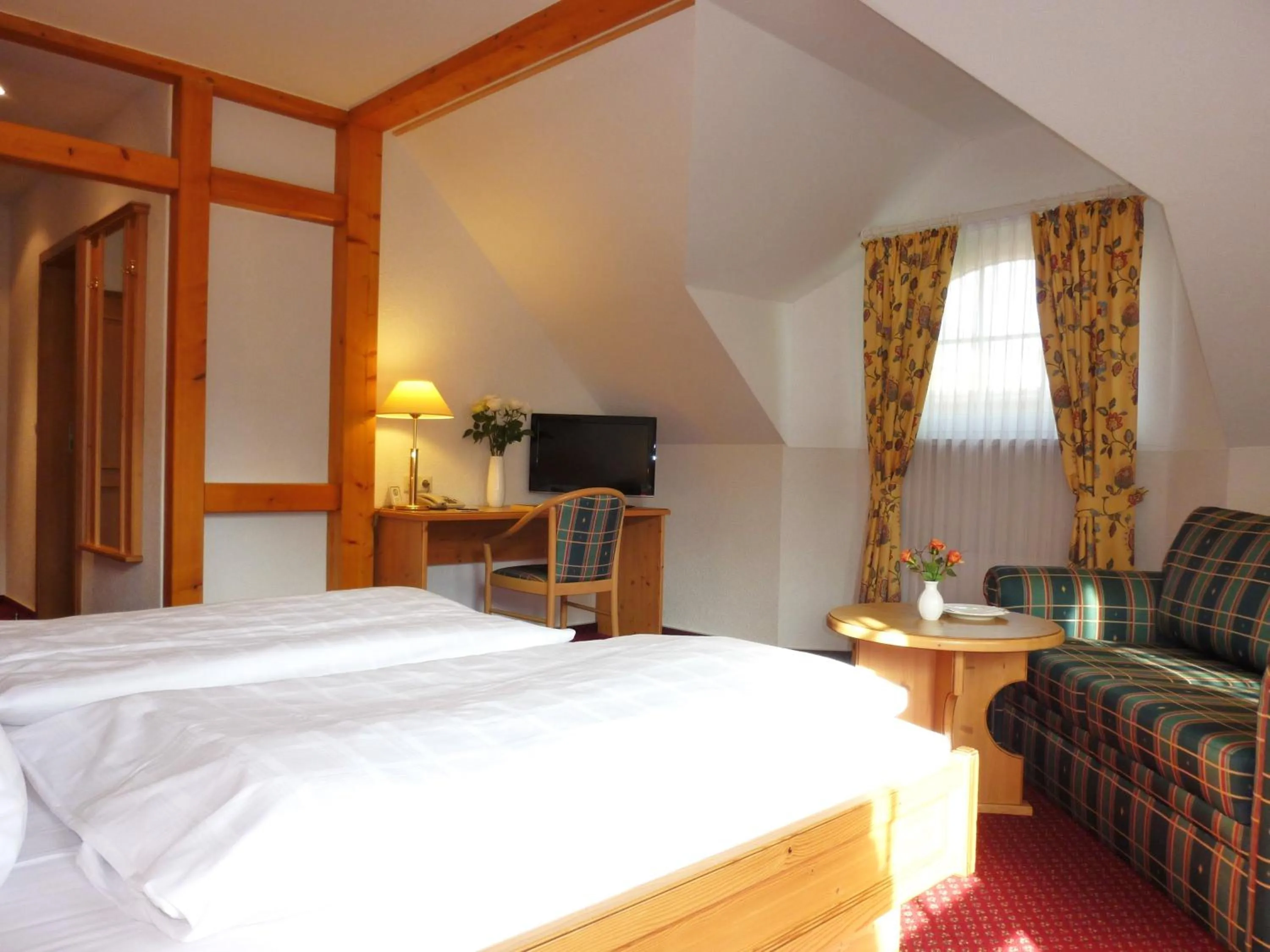 Bed in Landhaus Müritzgarten Hotel garni