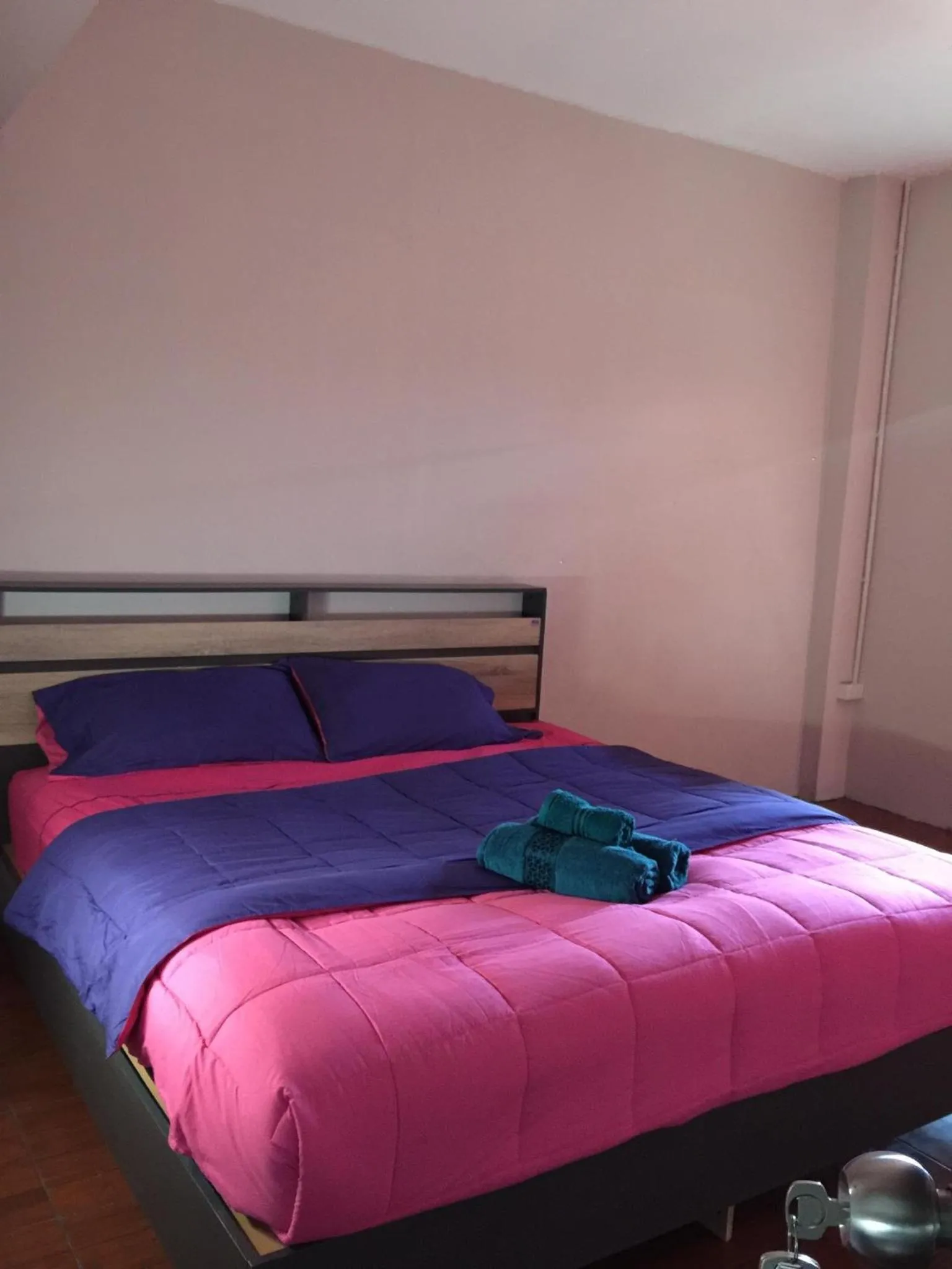 Bed in SMILE HOME GUESTHOUSE