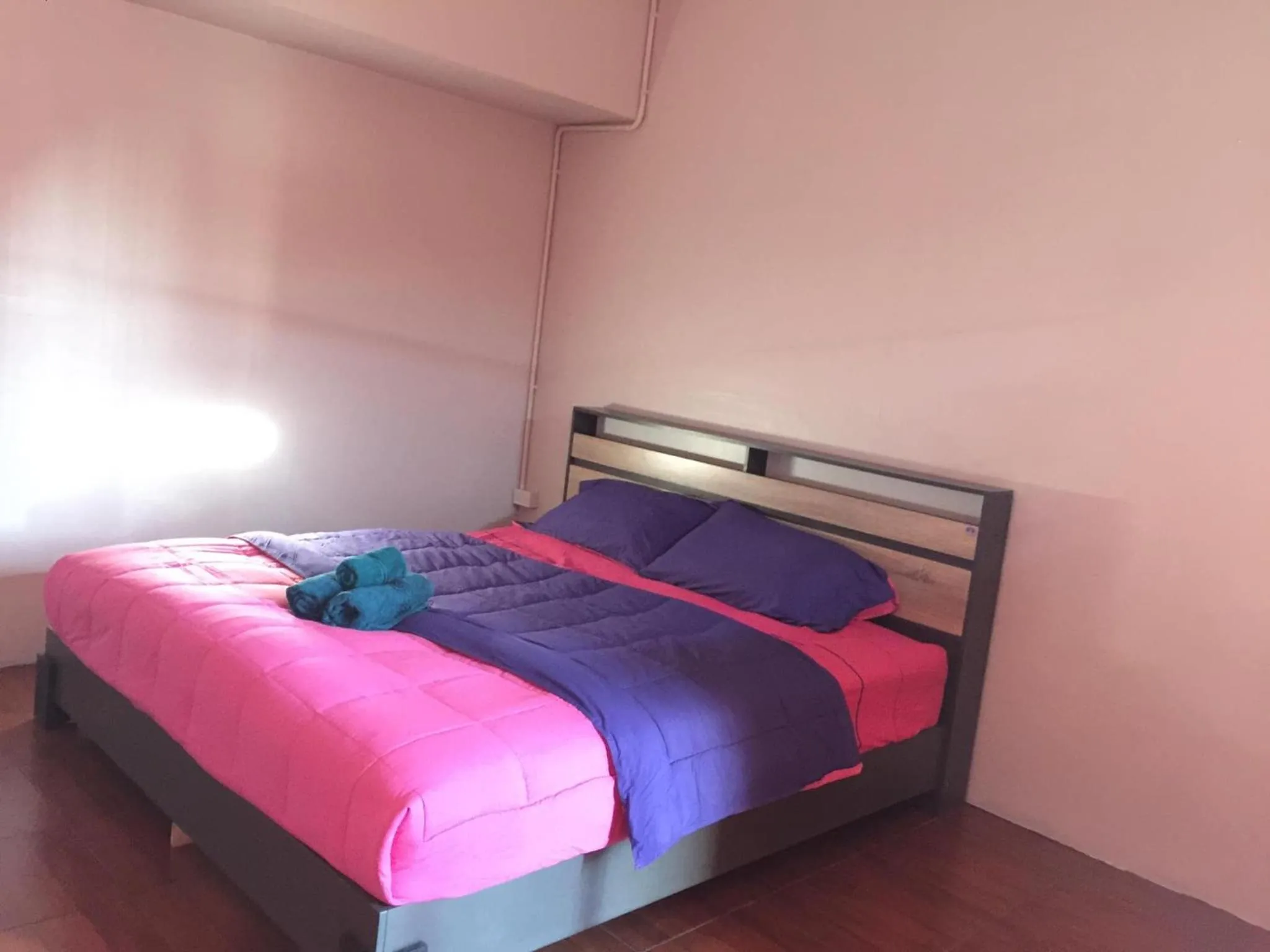 Bed in SMILE HOME GUESTHOUSE