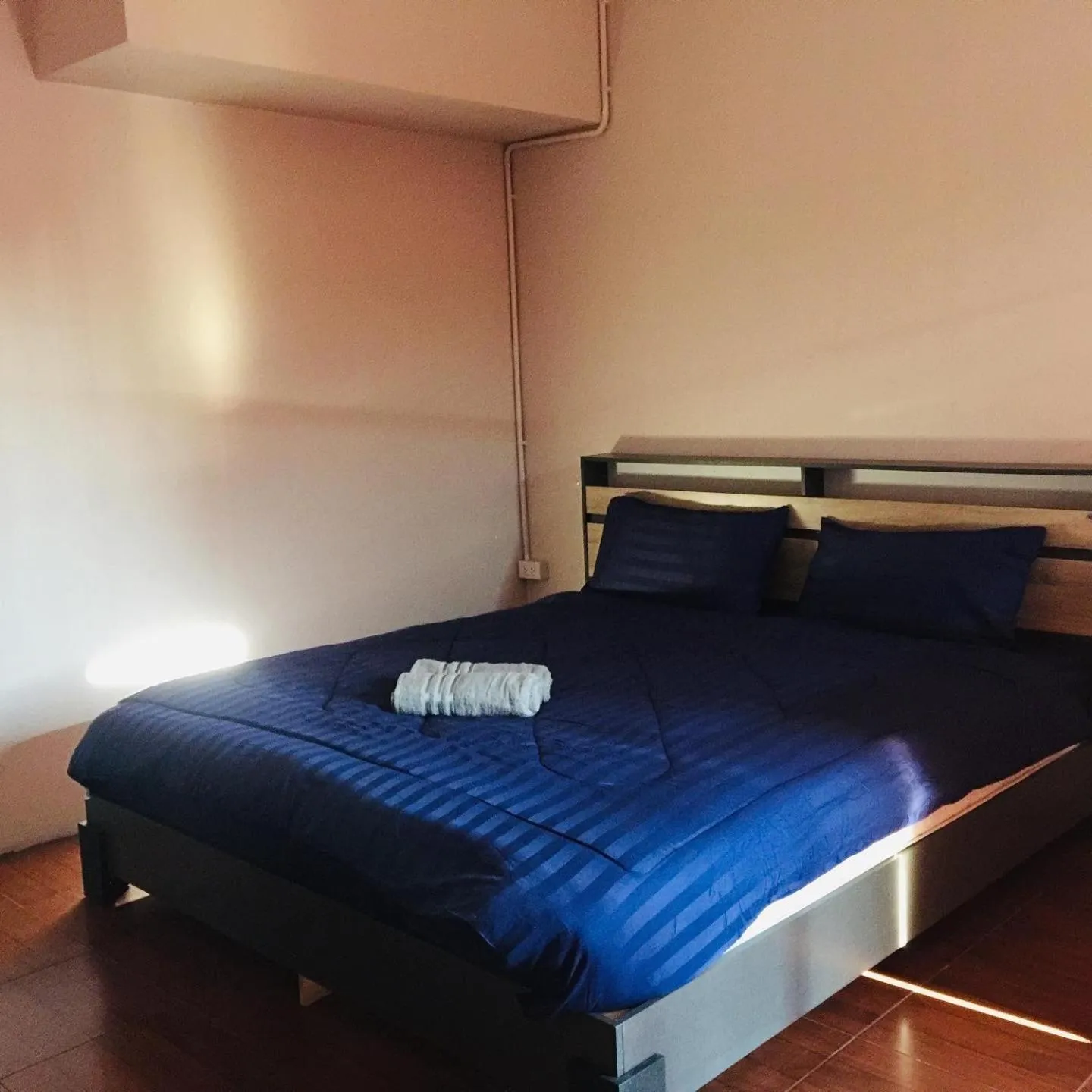 Bed in SMILE HOME GUESTHOUSE