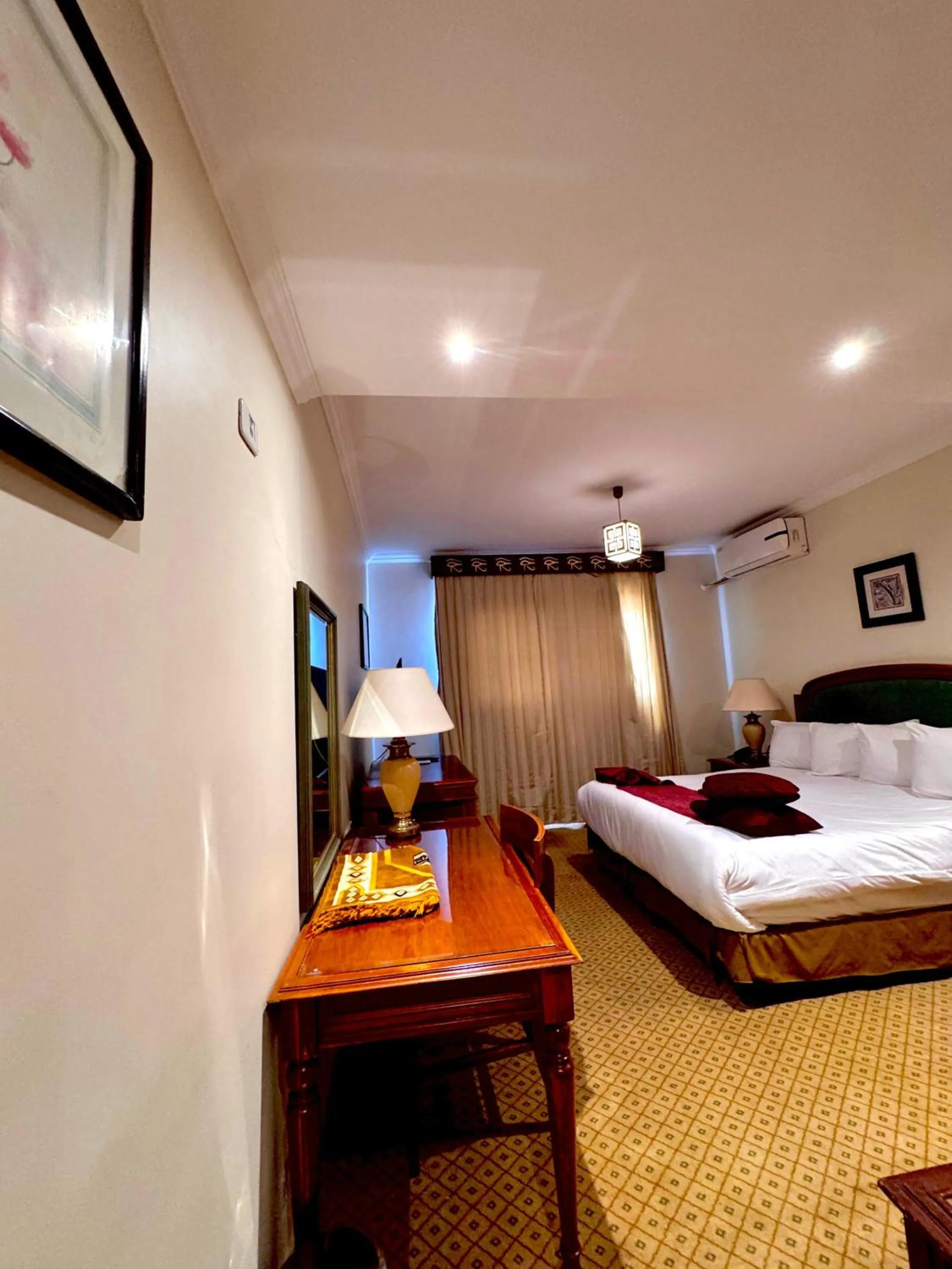 Bed in PYRAMIDS TOWER Inn