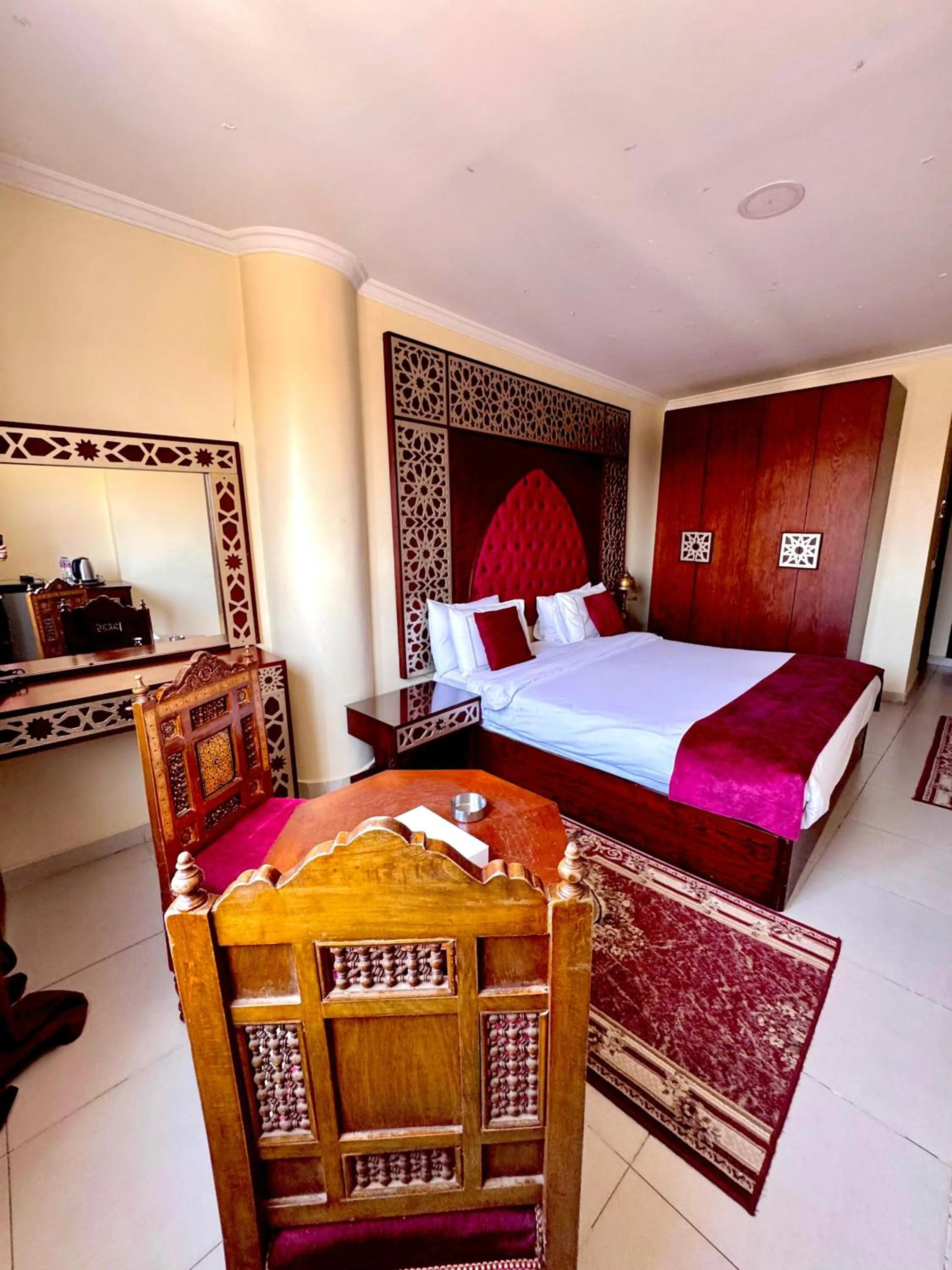 Bed in PYRAMIDS TOWER Inn