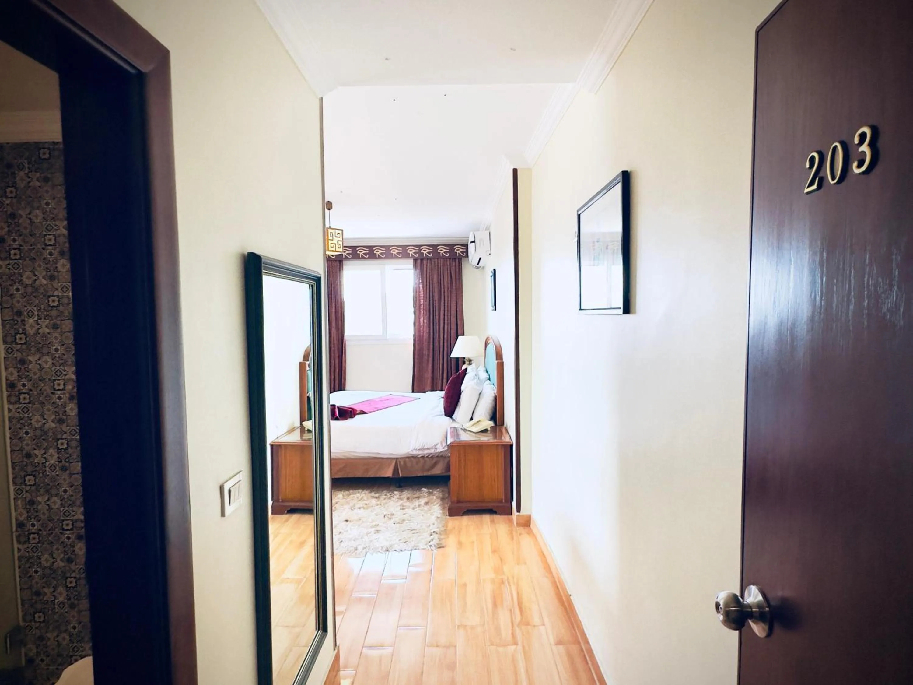 Bed in PYRAMIDS TOWER Inn