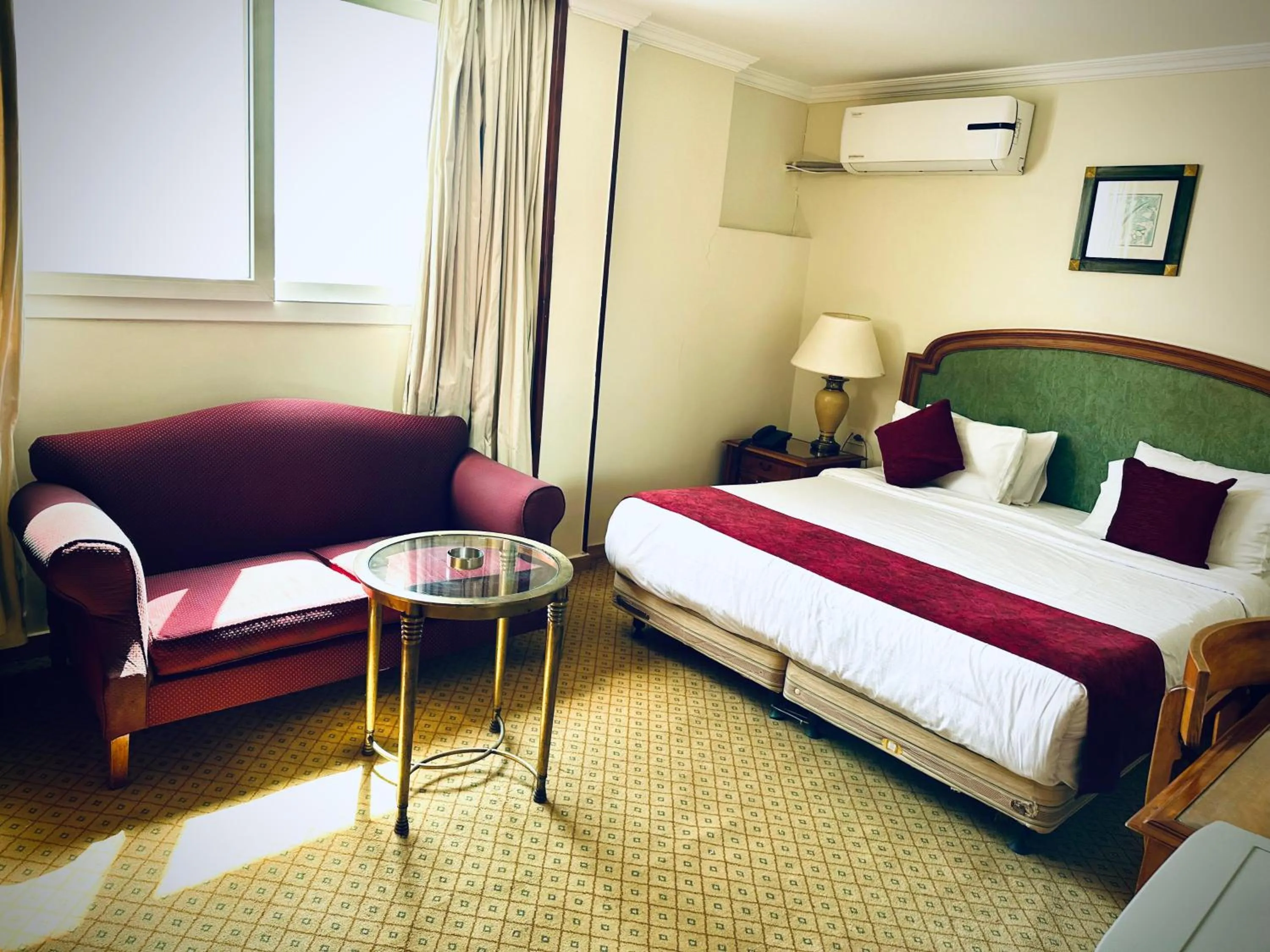 Bed in PYRAMIDS TOWER Inn